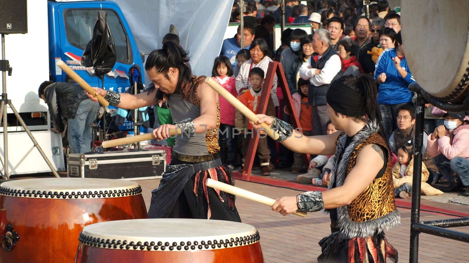 KAOHSIUNG, TAIWAN - JANUARY 23: The Japanese percussion group TenDrum performs outside the Cultural Center for the Chinese New Year on January 23, 2012 in Kaohsiung