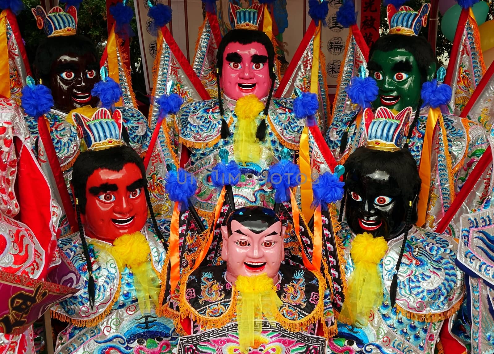 KAOHSIUNG, TAIWAN -- AUGUST 15, 2015: Elaborate masks for the dancers of the Third Prince temple carnival are on display at the Sanfeng Temple.
