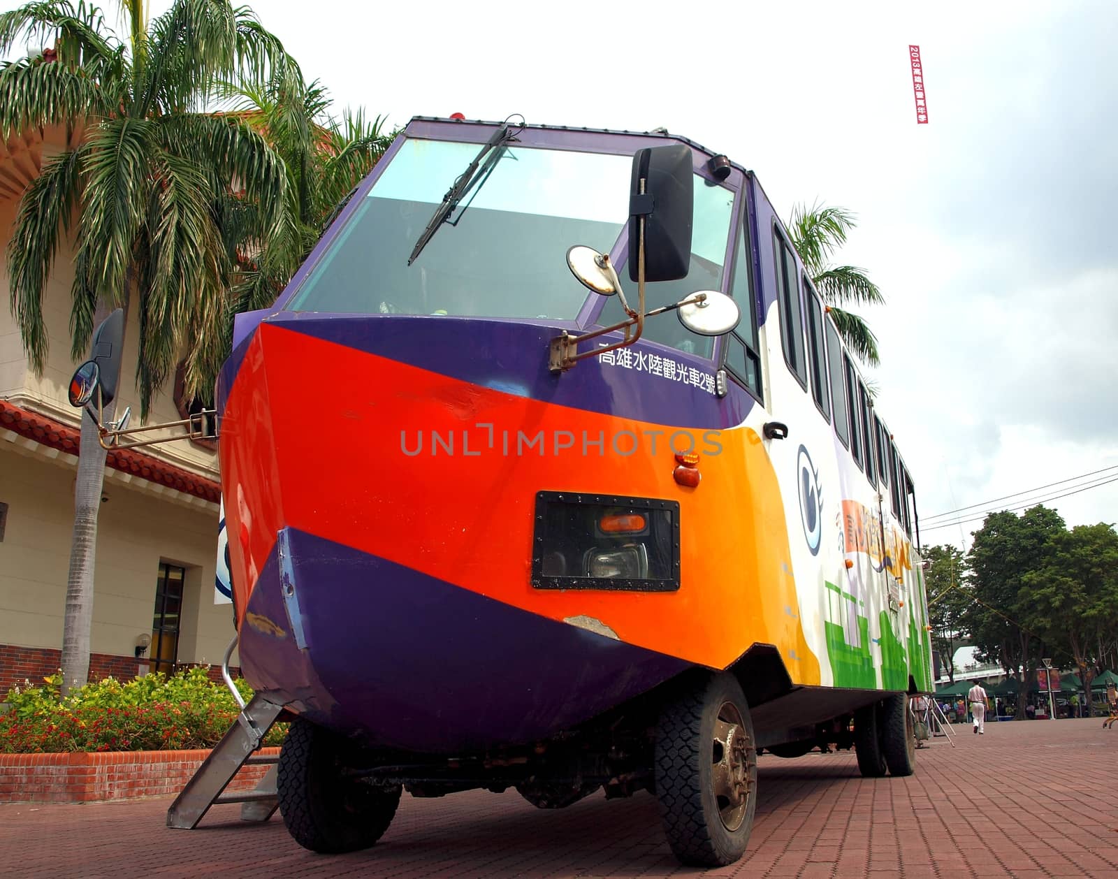 KAOHSIUNG, TAIWAN -- OCTOBER 13: A special amphibious city bus transports visitors to the yearly Wannian Folklore Festival on October 13, 2013 in Kaohsiung.