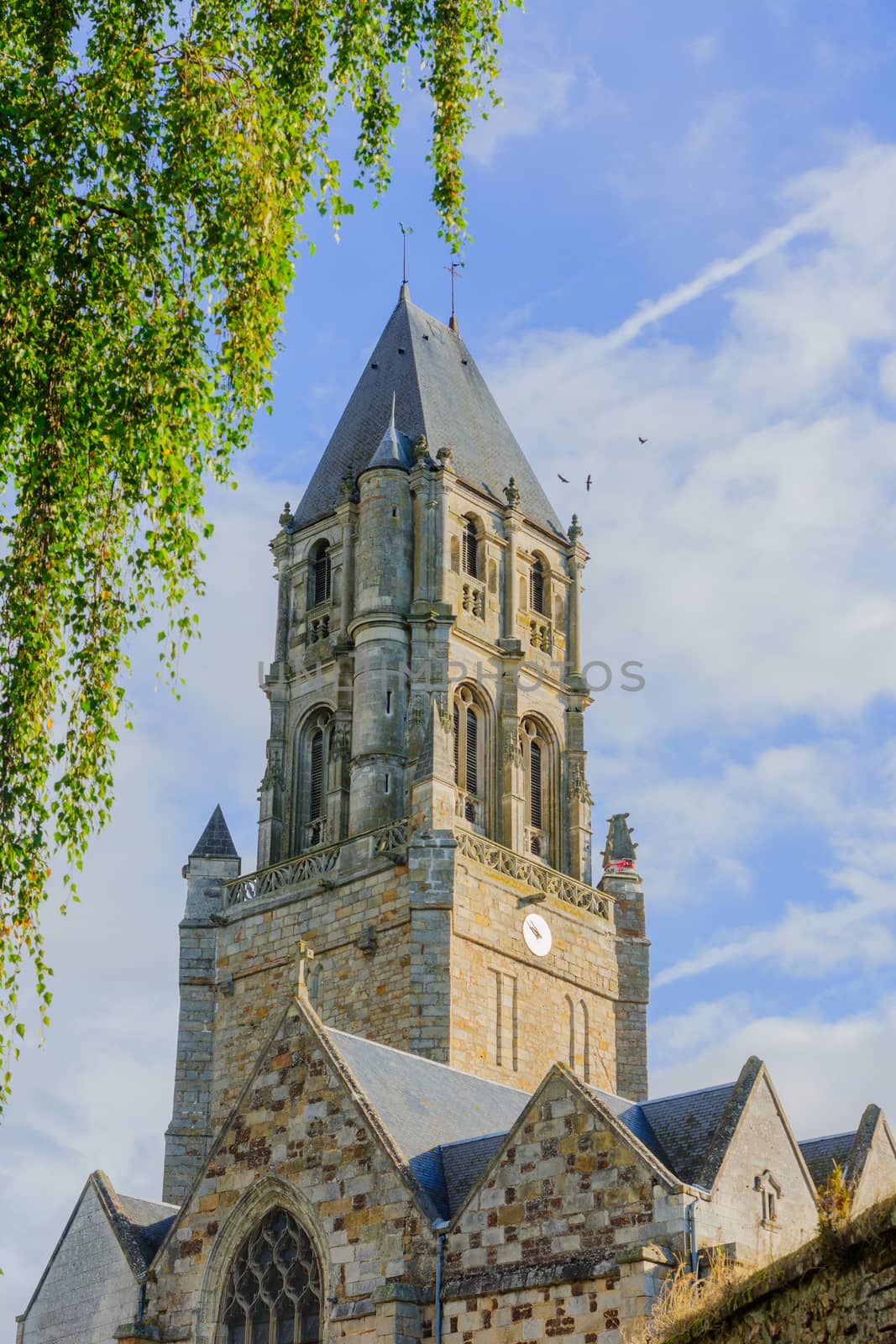 View of the church tower in the village Orbec, in the Calvados department in the Normandy region in northwestern France