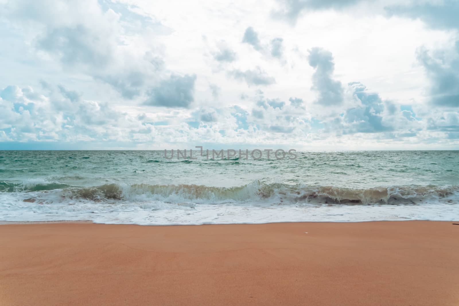 Tropical nature clean beach and white sand in summer with sun light blue sky and bokeh abstract  background.