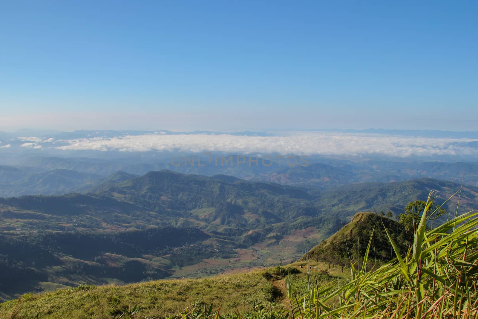 Views of the mountains with colorful sky. And fog in the morning.