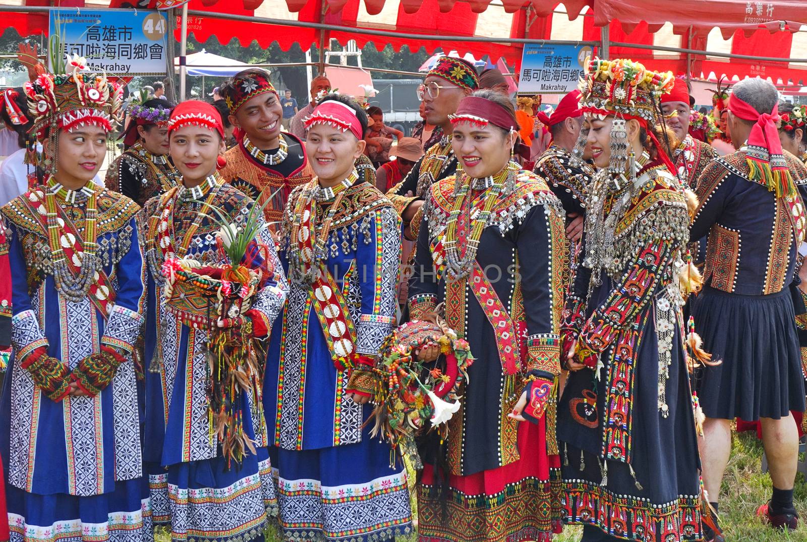 KAOHSIUNG, TAIWAN -- SEPTEMBER 28, 2019: Women of the indigenous Rukai tribe prepare for a dance during the traditional harvest festival.