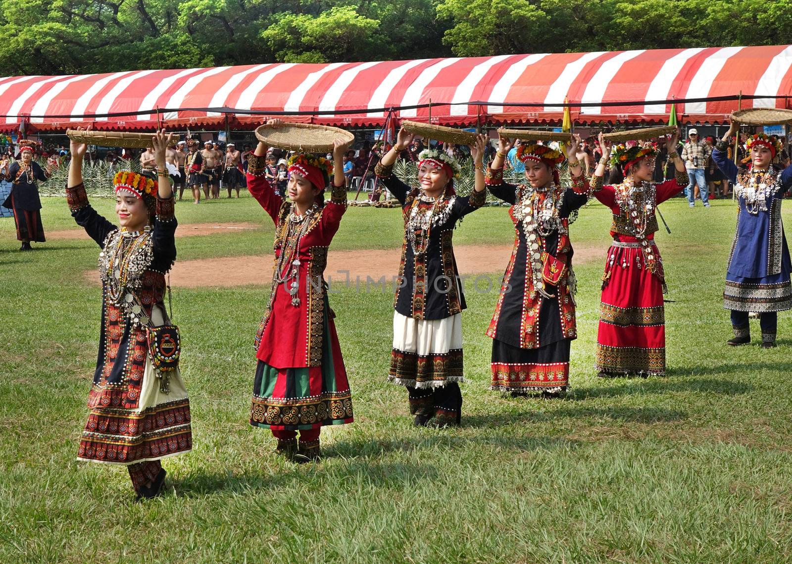 KAOHSIUNG, TAIWAN -- SEPTEMBER 28, 2019: Women of the indigenous Rukai tribe perform a dance during the traditional harvest festival.