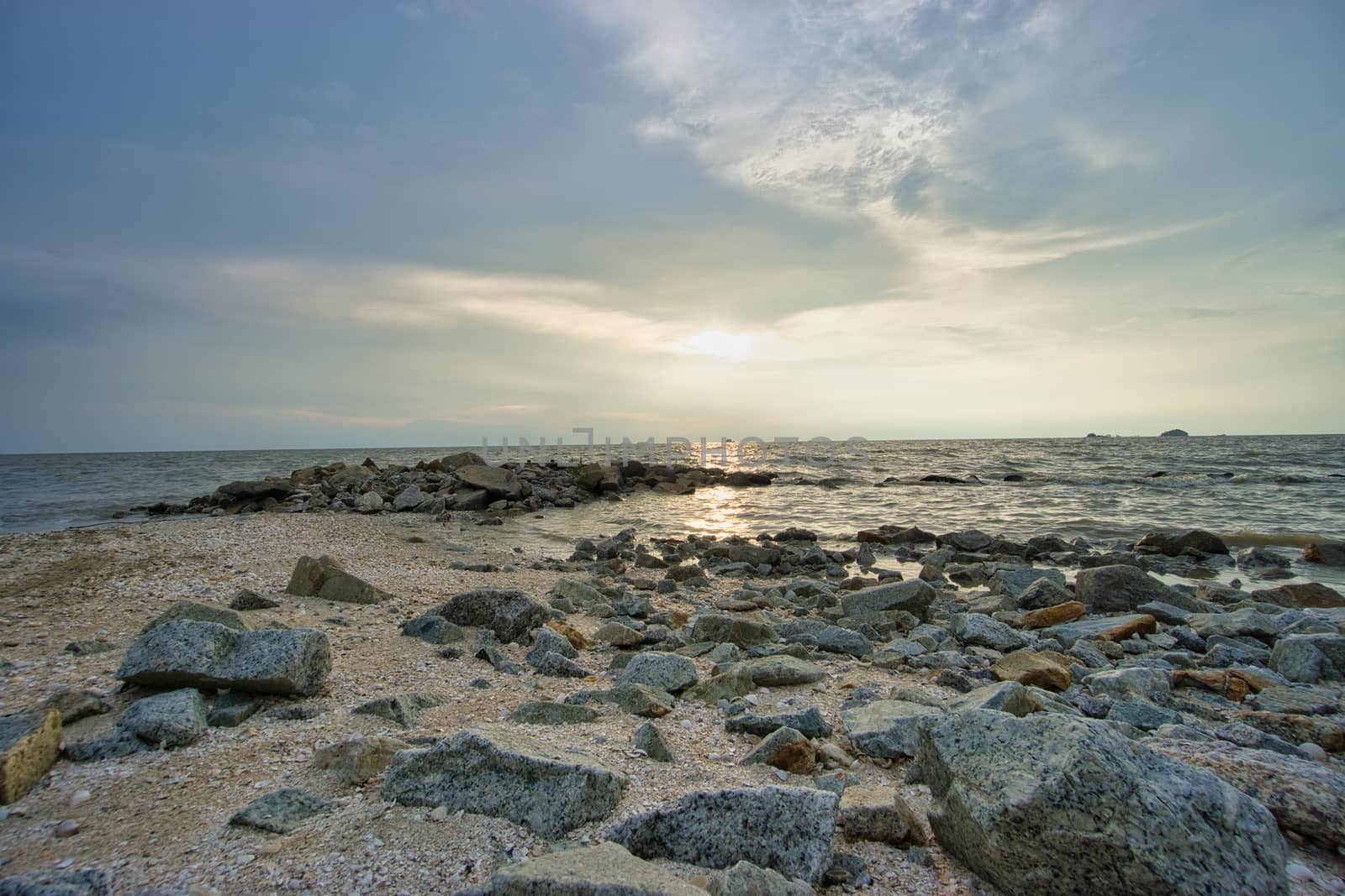 Peaceful beach view and waves during sunset at Jeram, Kuala Selangor Malaysia