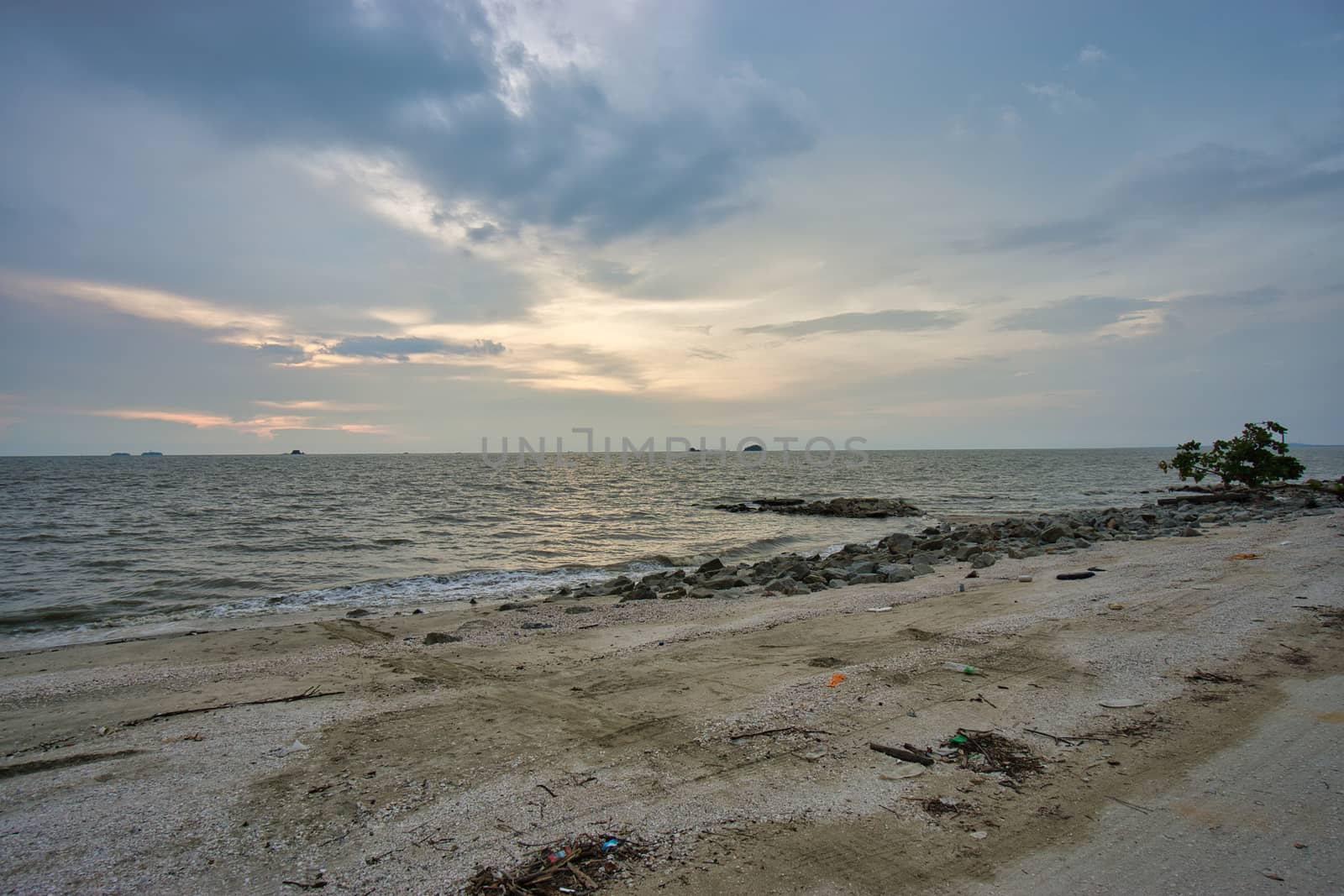 Peaceful beach view and waves during sunset  by silverwings