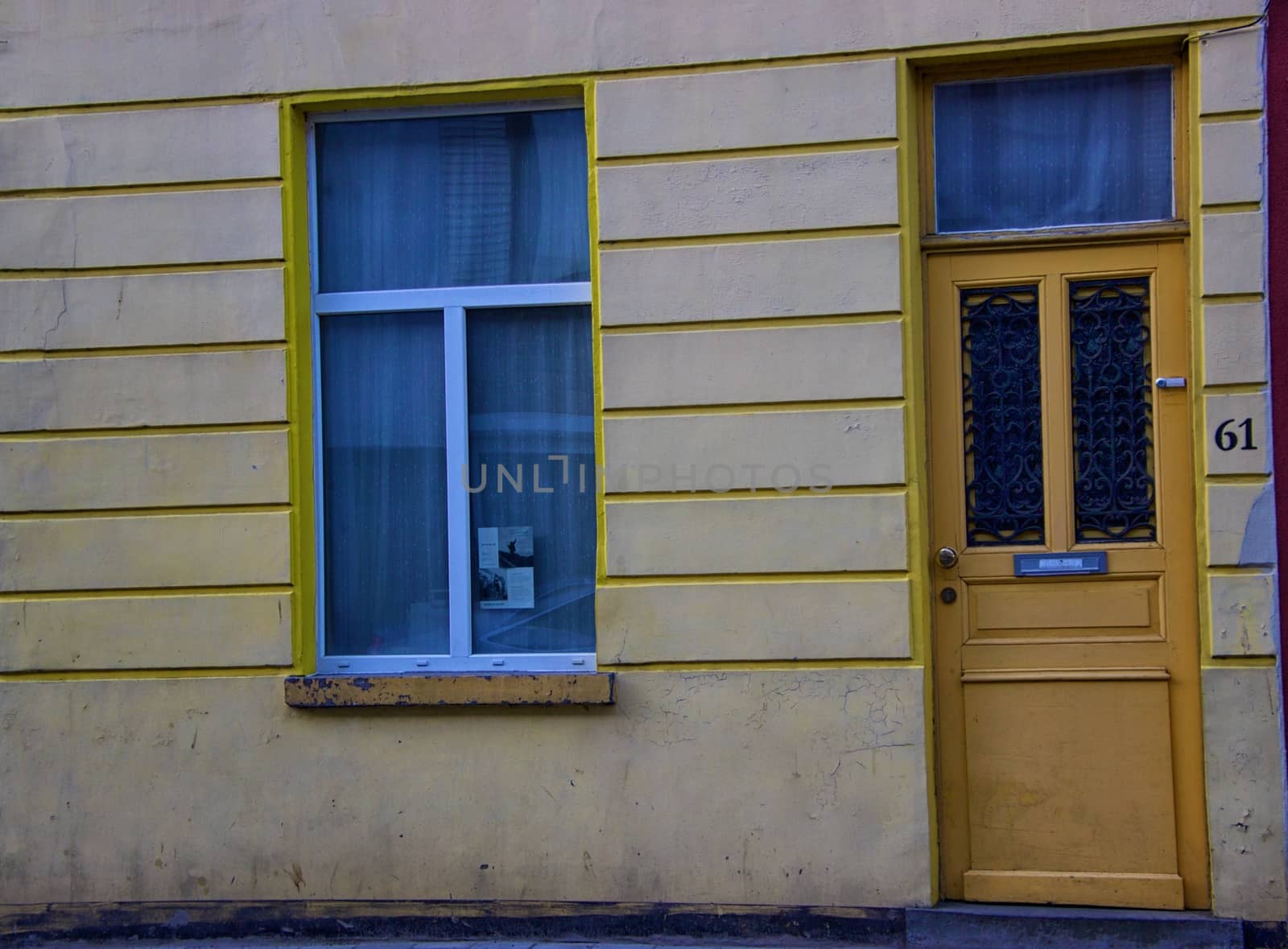Detail of a house - Yellow door