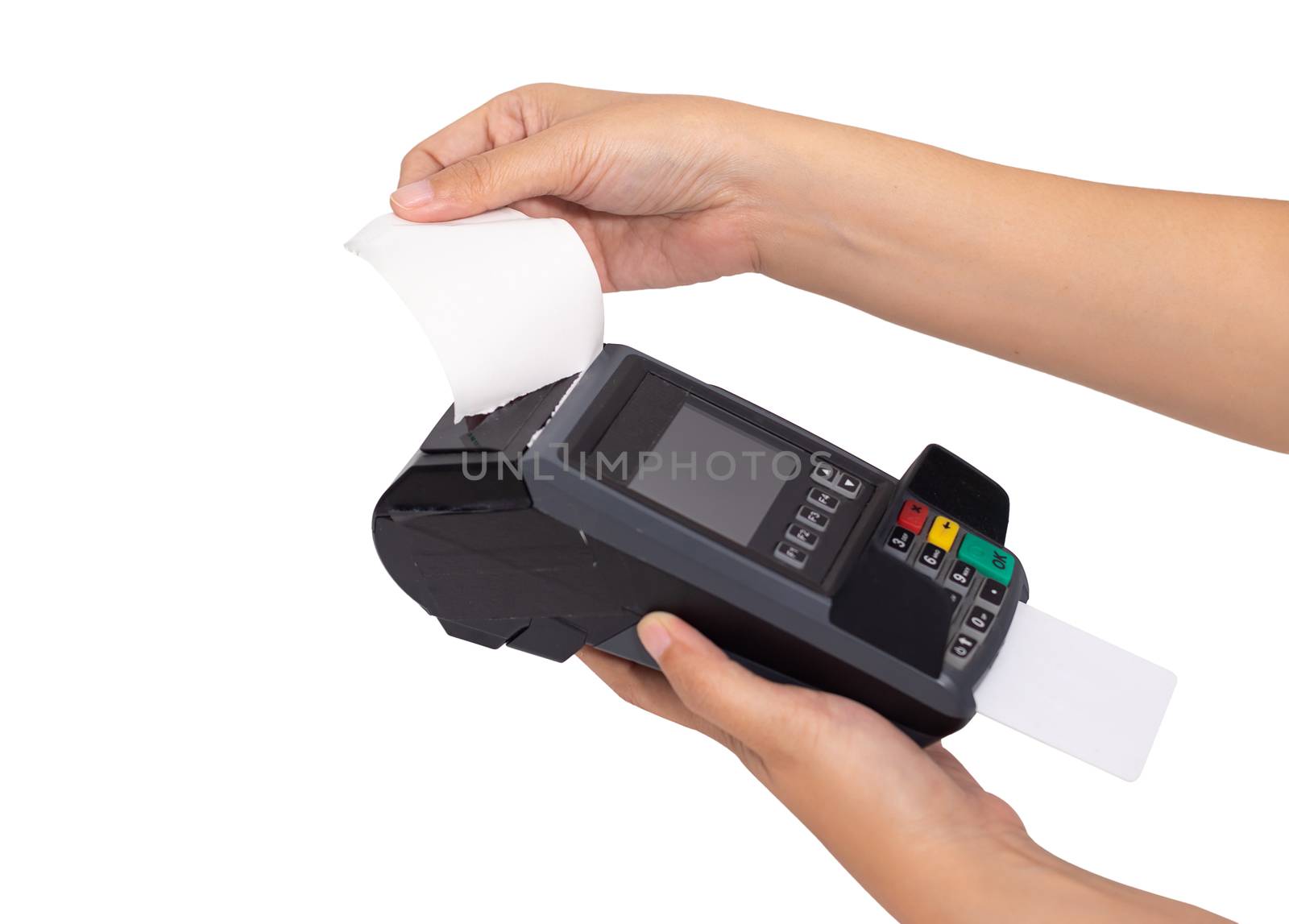 close up of merchant hand split receipt paper from credit card swipe machine at point of sale terminal, clipping path include by asiandelight