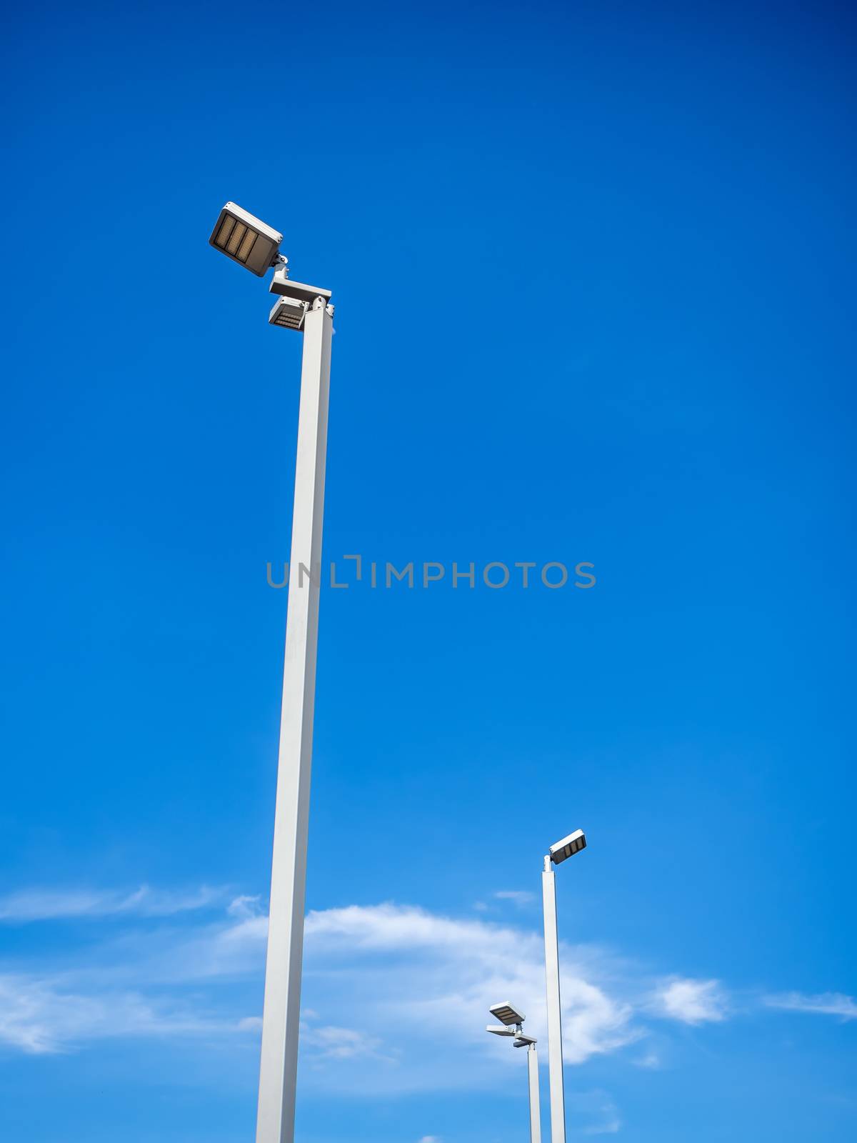 LED street lighting pole on blue sky background. by tete_escape