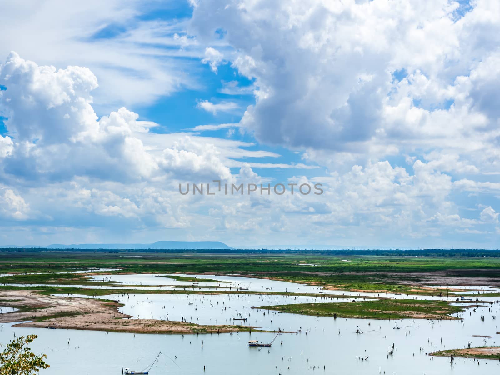 Beautiful cloud and blue sky with landscape of swamp background. by tete_escape