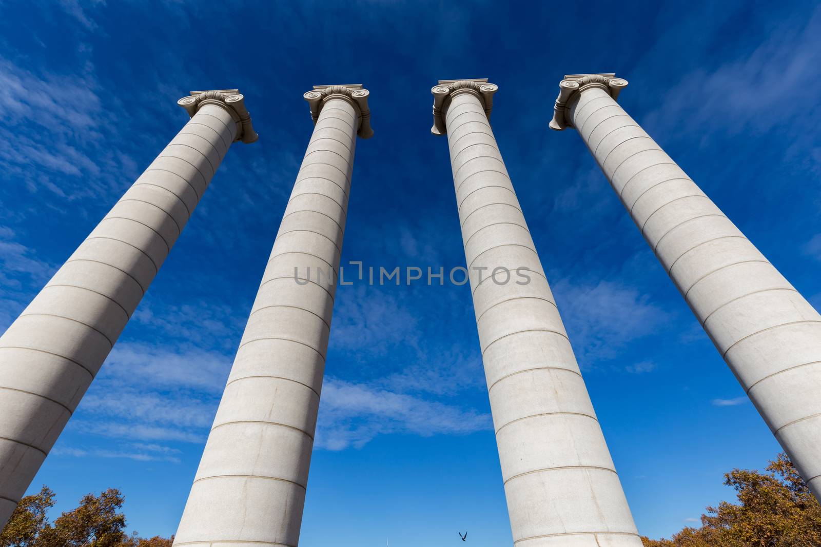 Four massive columns, blue sky in Barcelona of Spain