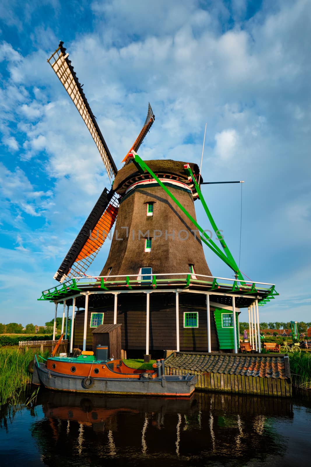 Netherlands rural lanscape - windmills at famous tourist site Zaanse Schans in Holland. Zaandam, Netherlands
