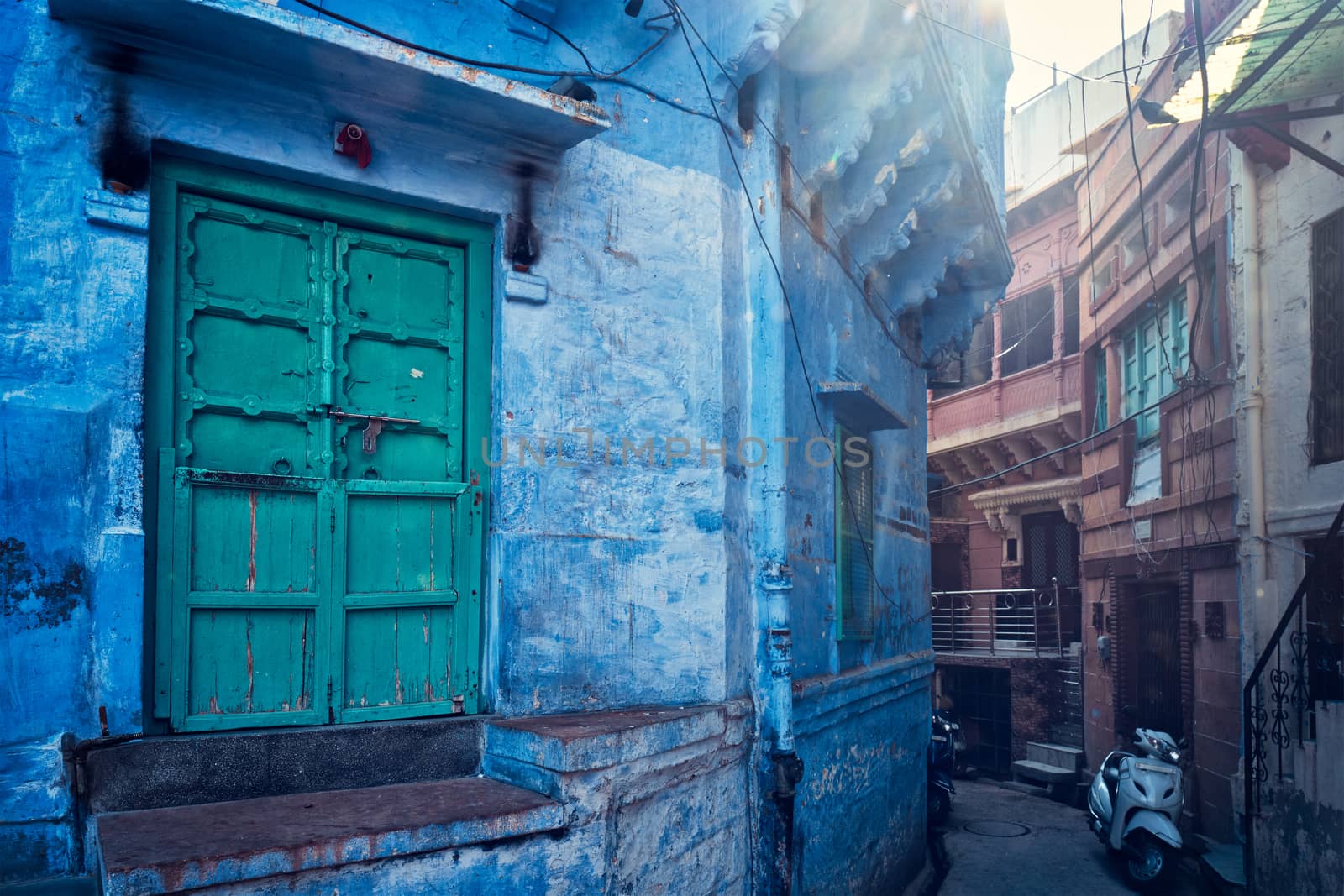 Blue houses in streets of of Jodhpur, also known as "Blue City" due to the vivid blue-painted Brahmin houses, Jodhpur, Rajasthan, India