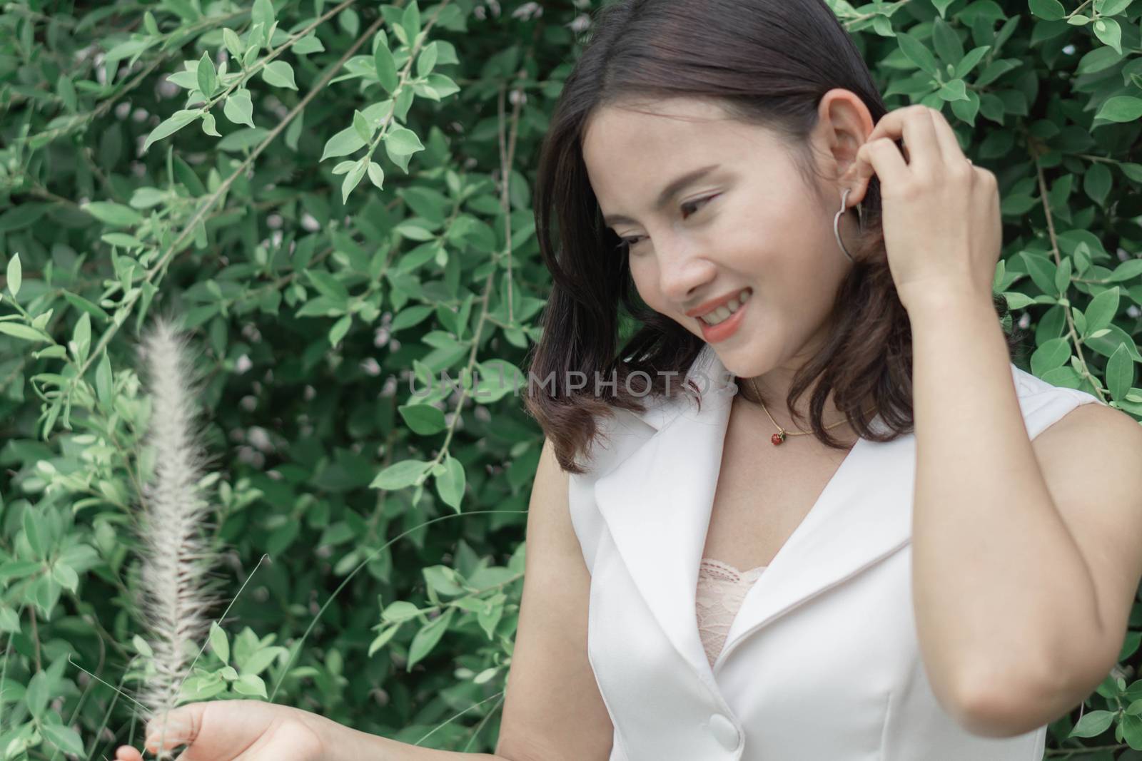 Woman happy feeling with green nature background by pt.pongsak@gmail.com