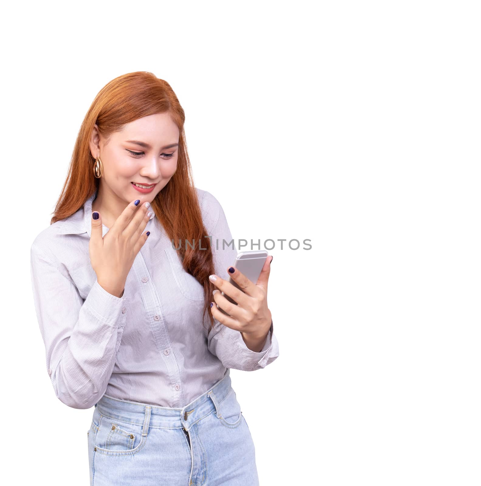 cheerful cute beautiful young Asian woman chatting with friend in social network by mobile phone ,feeling surprised isolated on white background with clipping path
