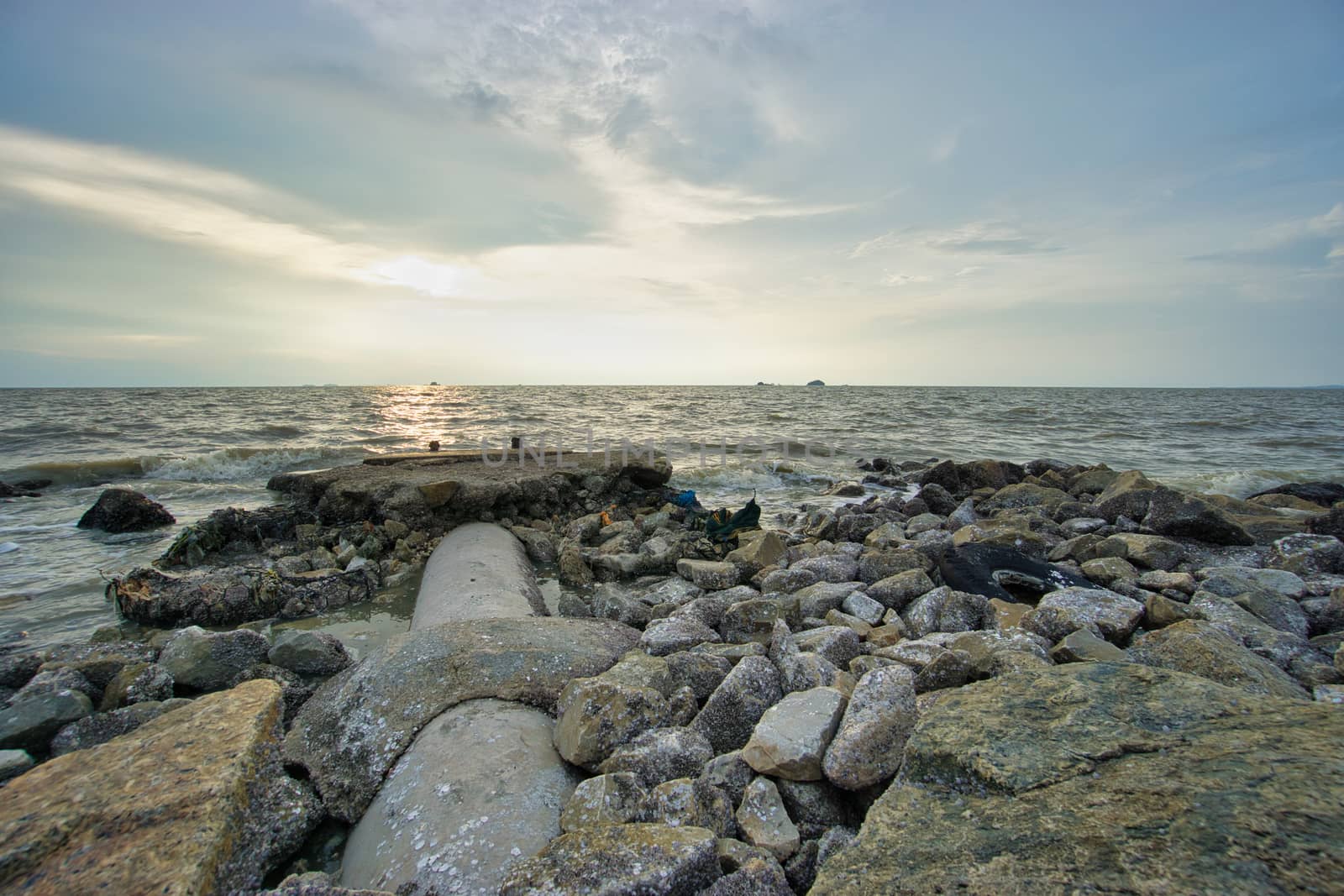 Peaceful beach view and waves during sunset at Jeram, Kuala Selangor Malaysia