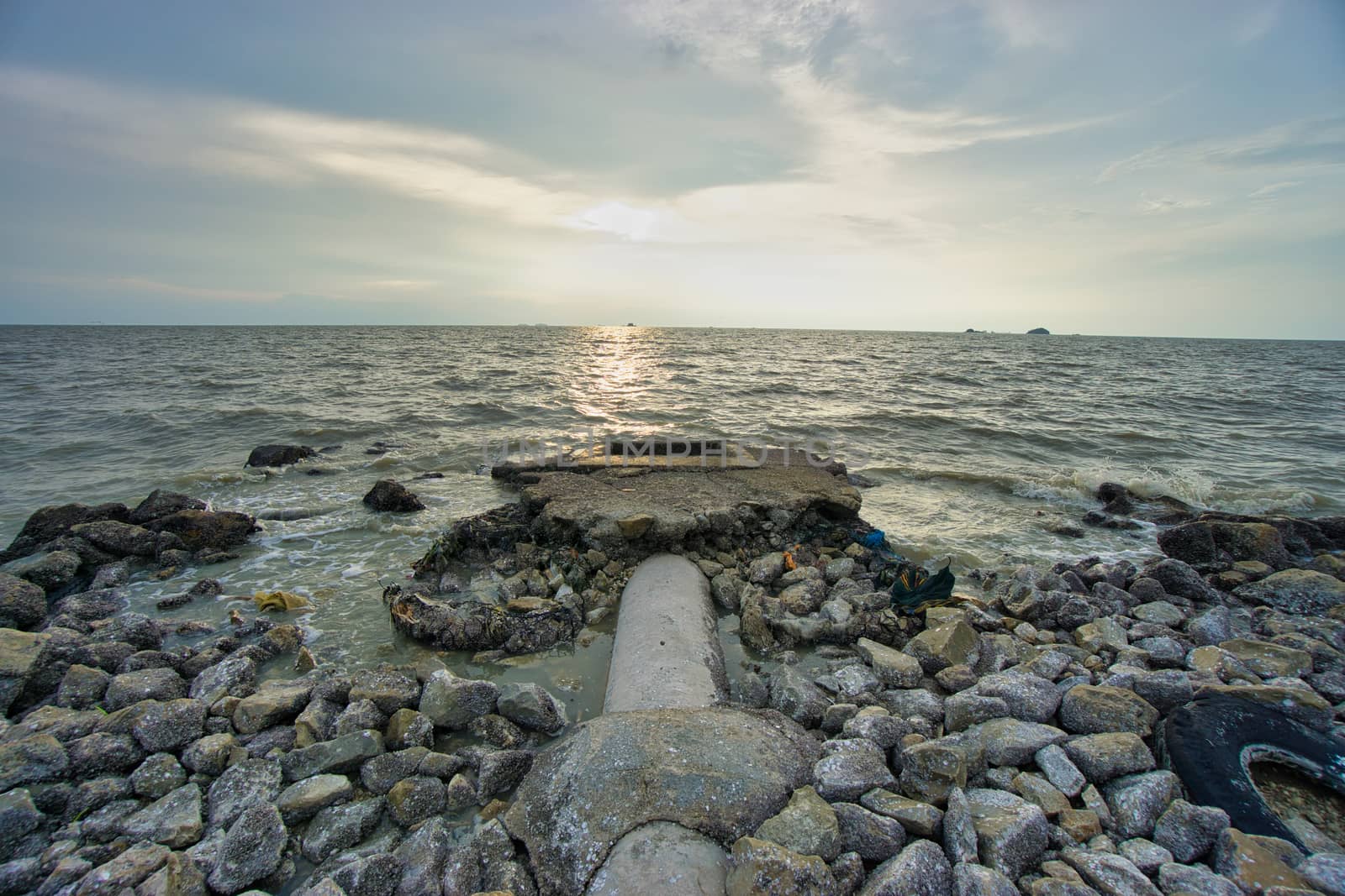 Peaceful beach view and waves during sunset at Jeram, Kuala Selangor Malaysia