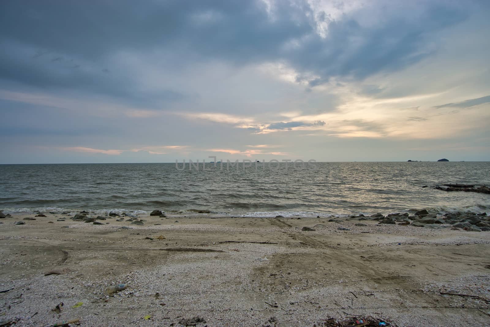 Peaceful beach view and waves during sunset  by silverwings