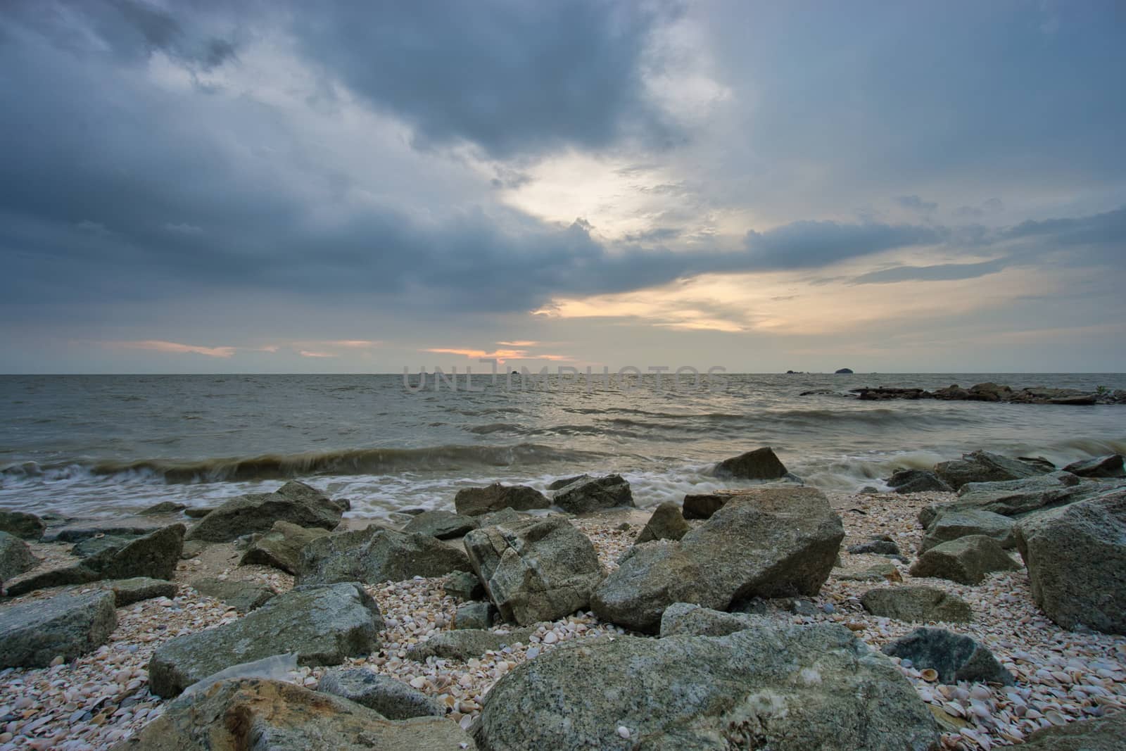 Peaceful beach view and waves during sunset at Jeram, Kuala Selangor Malaysia