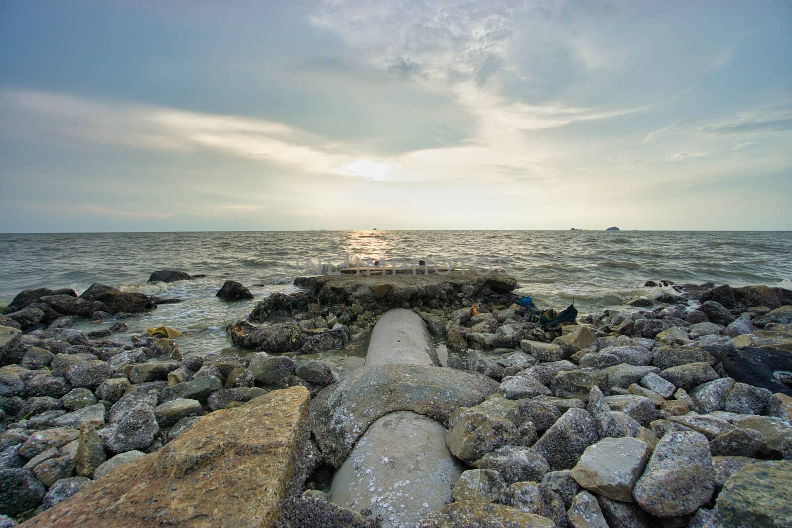 Peaceful beach view and waves during sunset  by silverwings