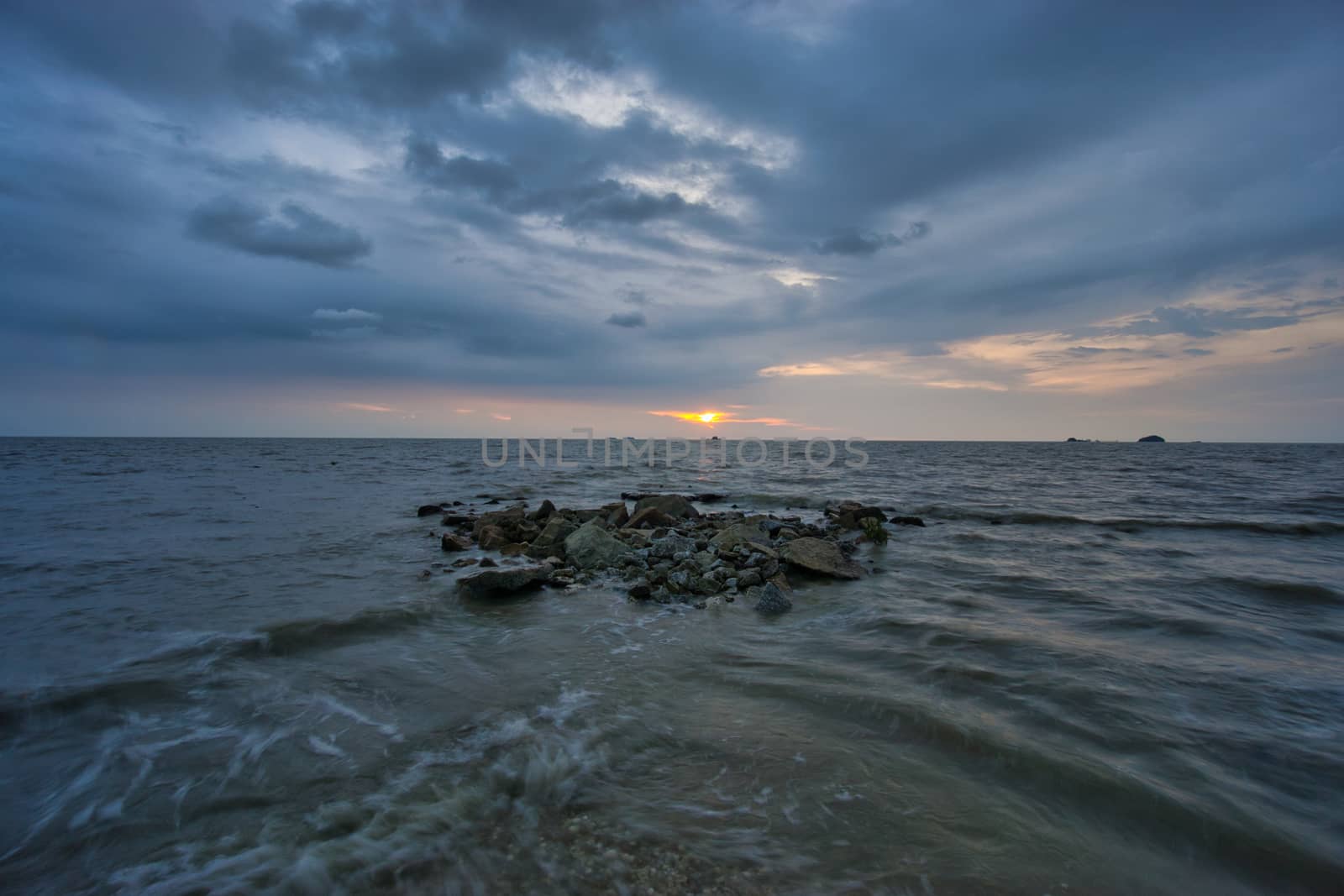 Peaceful beach view and waves during sunset  by silverwings