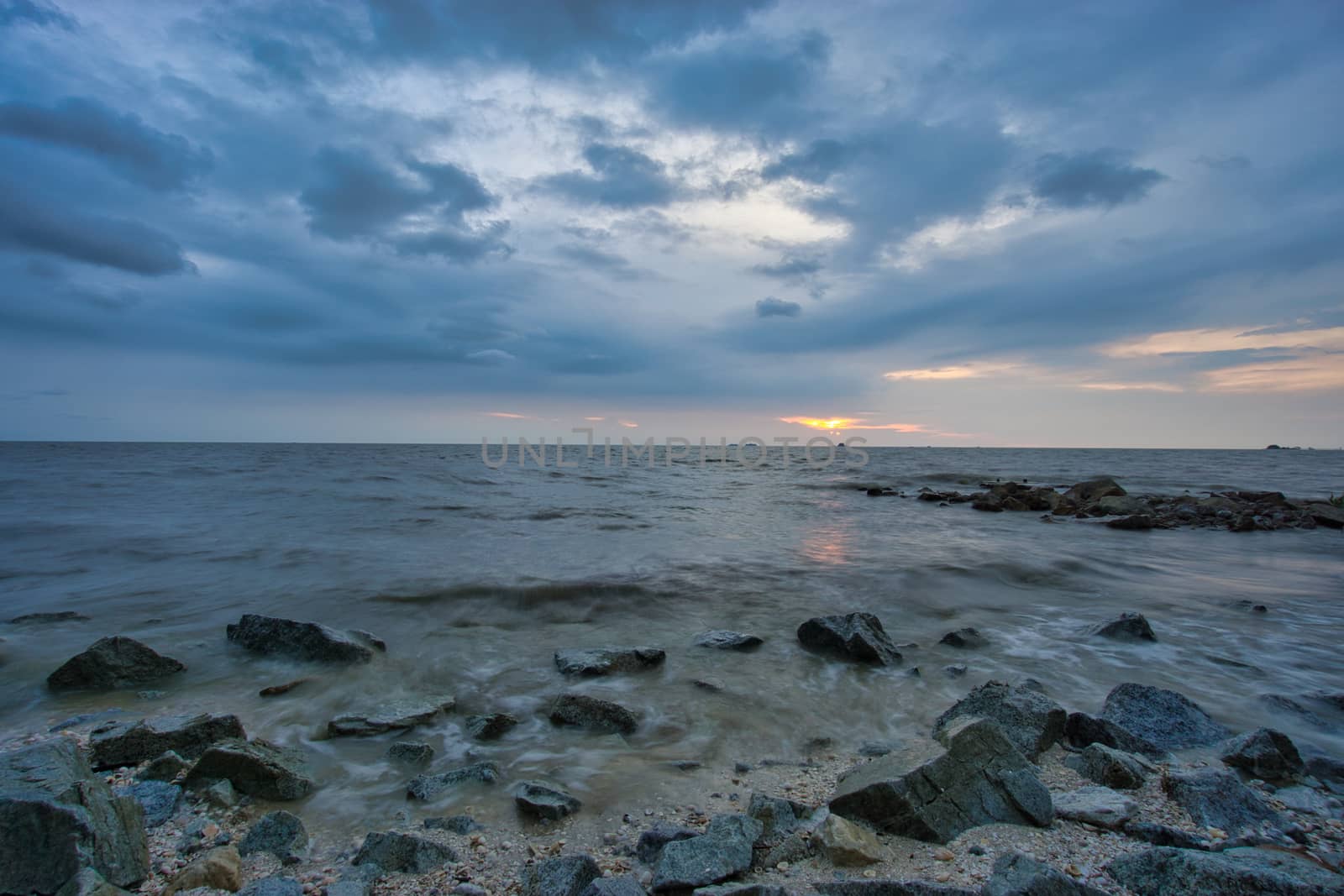 Peaceful beach view and waves during sunset  by silverwings