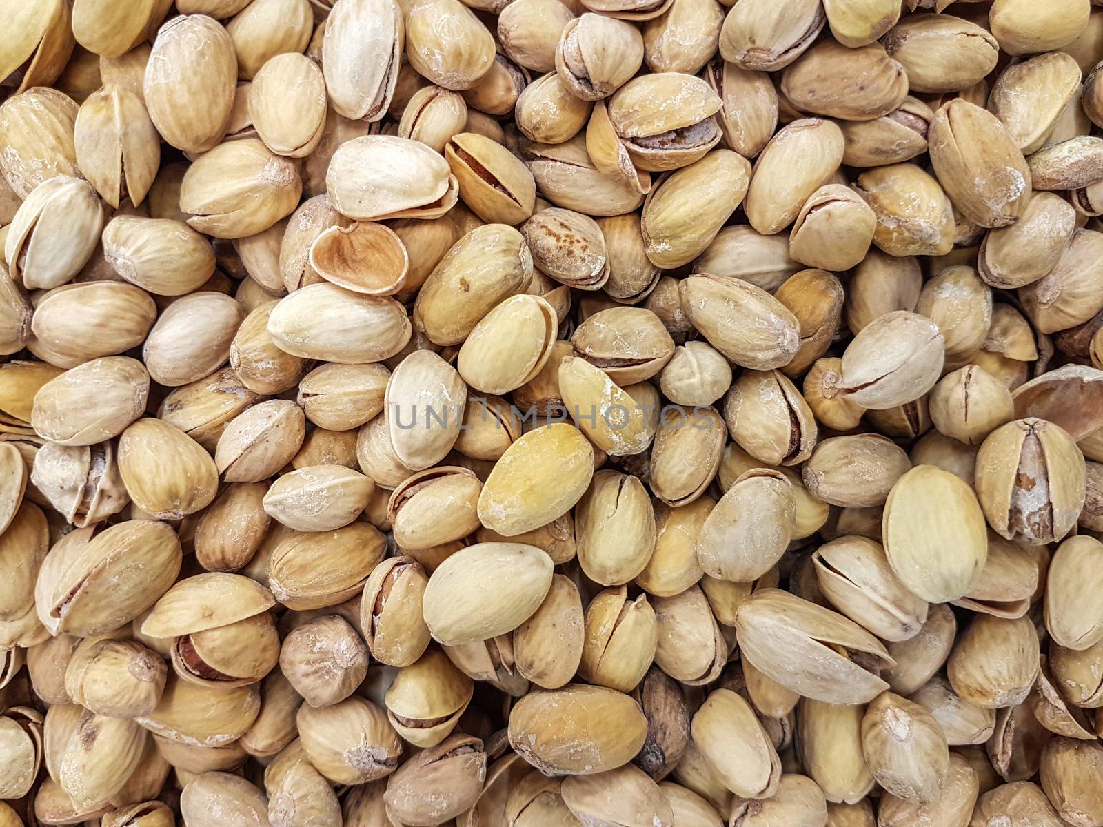 Roasted pistachios as a backgrounds or textures in close-up