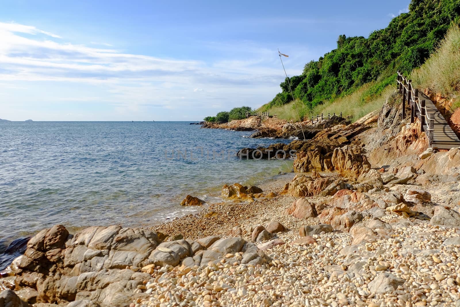 View of the beach around the walking path at Khao Laem Ya, Rayong, Thailand.