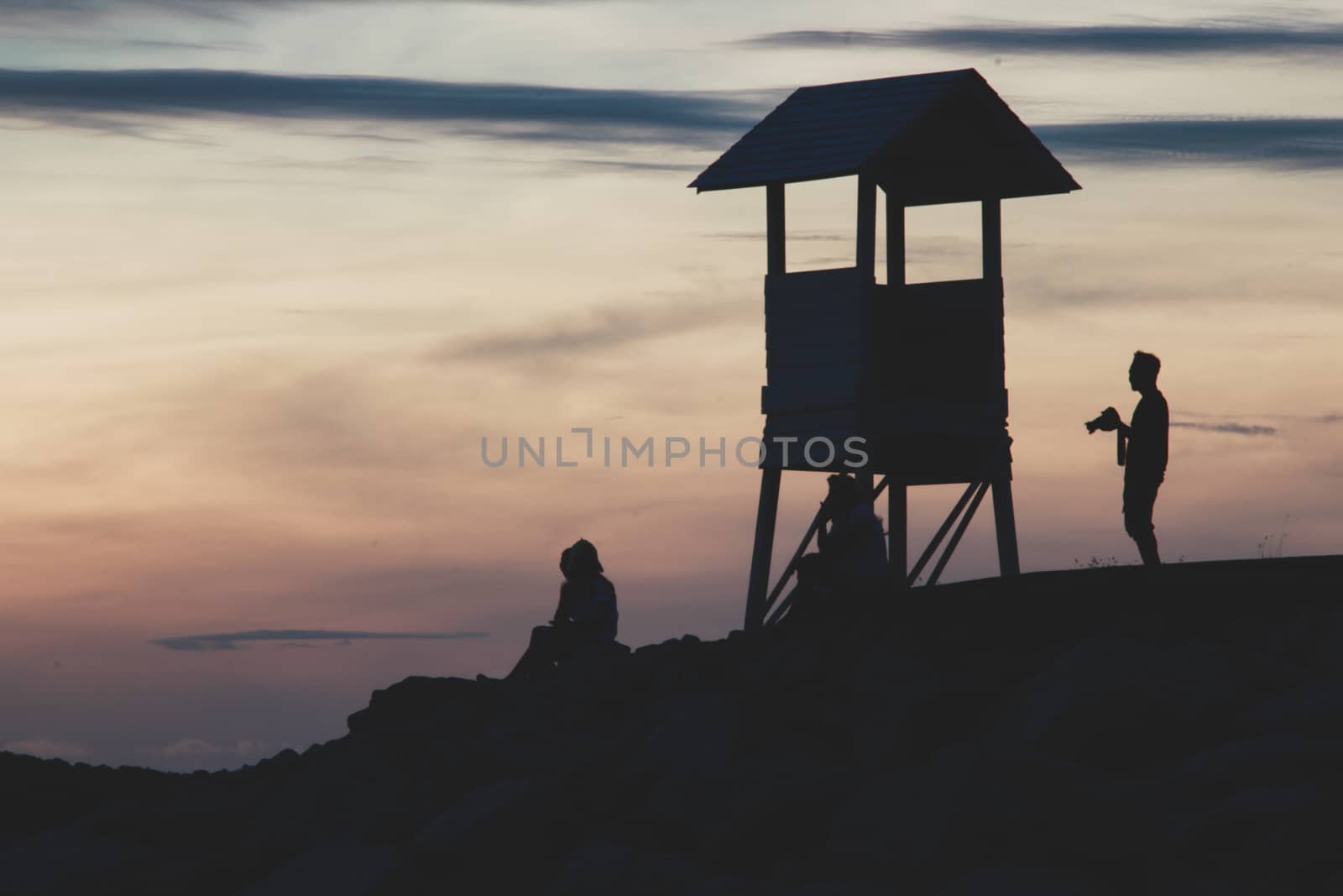 Silhouette of a small pavilion where people watch the morning sun At Khao Laem Ya National Park, Rayong.