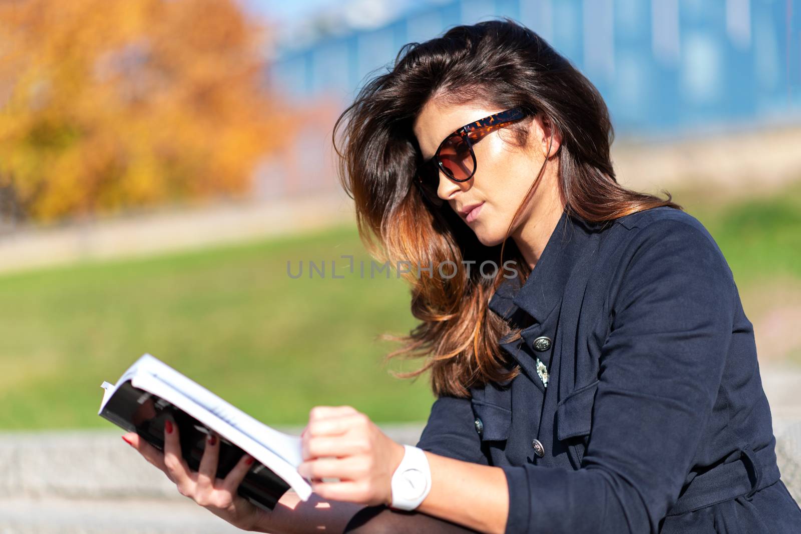 Woman reading a book by wdnet_studio