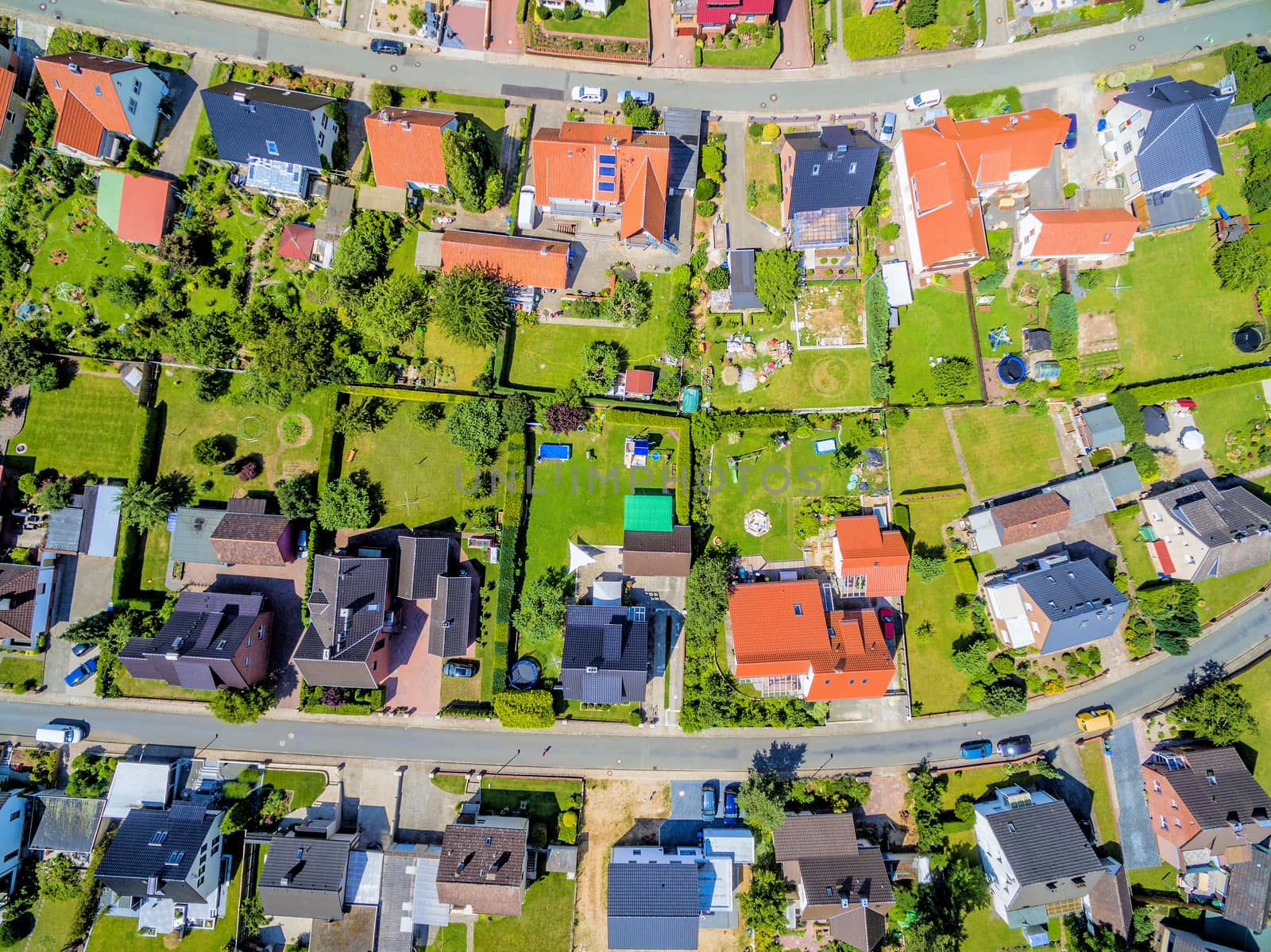 Housing development from houses with gardens. Aerial picture from the bird's-eye view