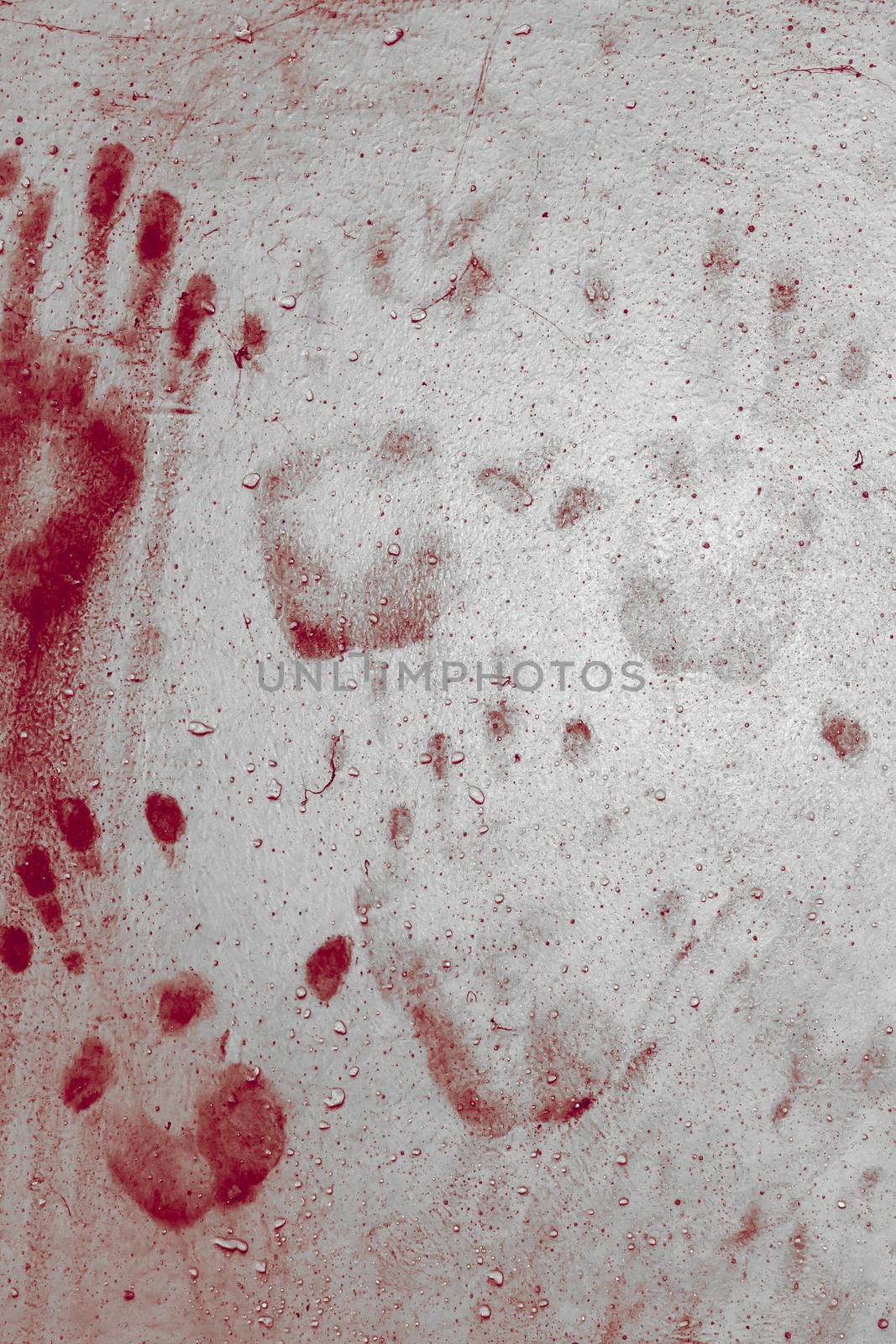 Grunge background with a print of a bloody hands. Ideas for background Halloween.