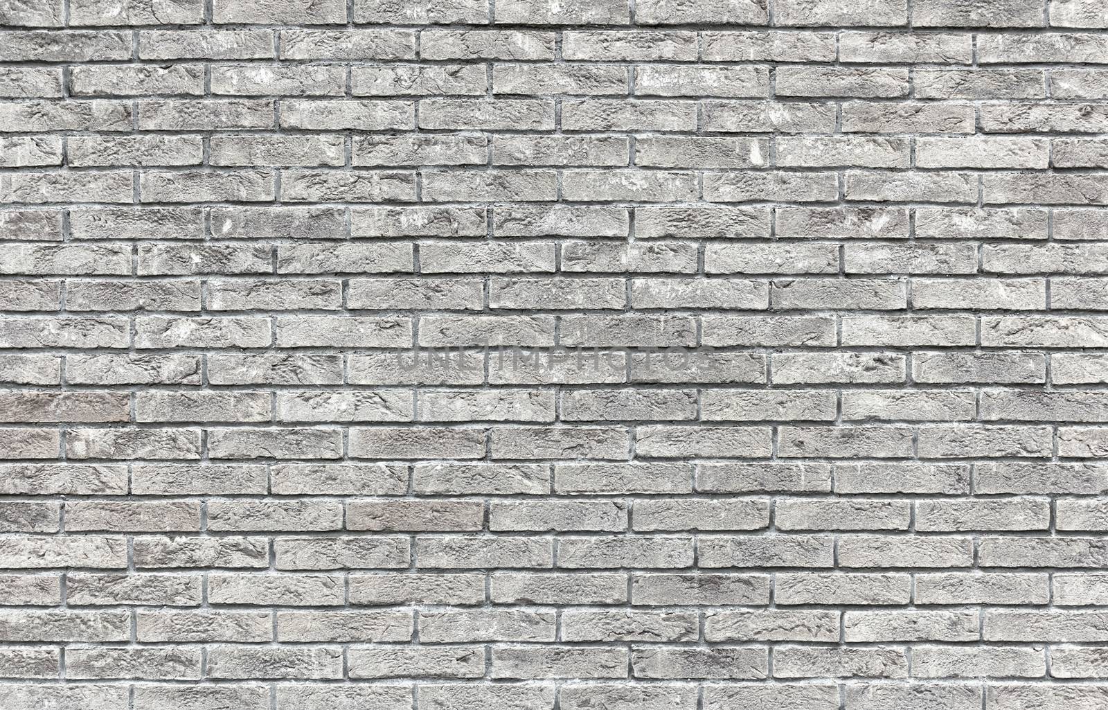 Brick wall texture or background, gray colour.