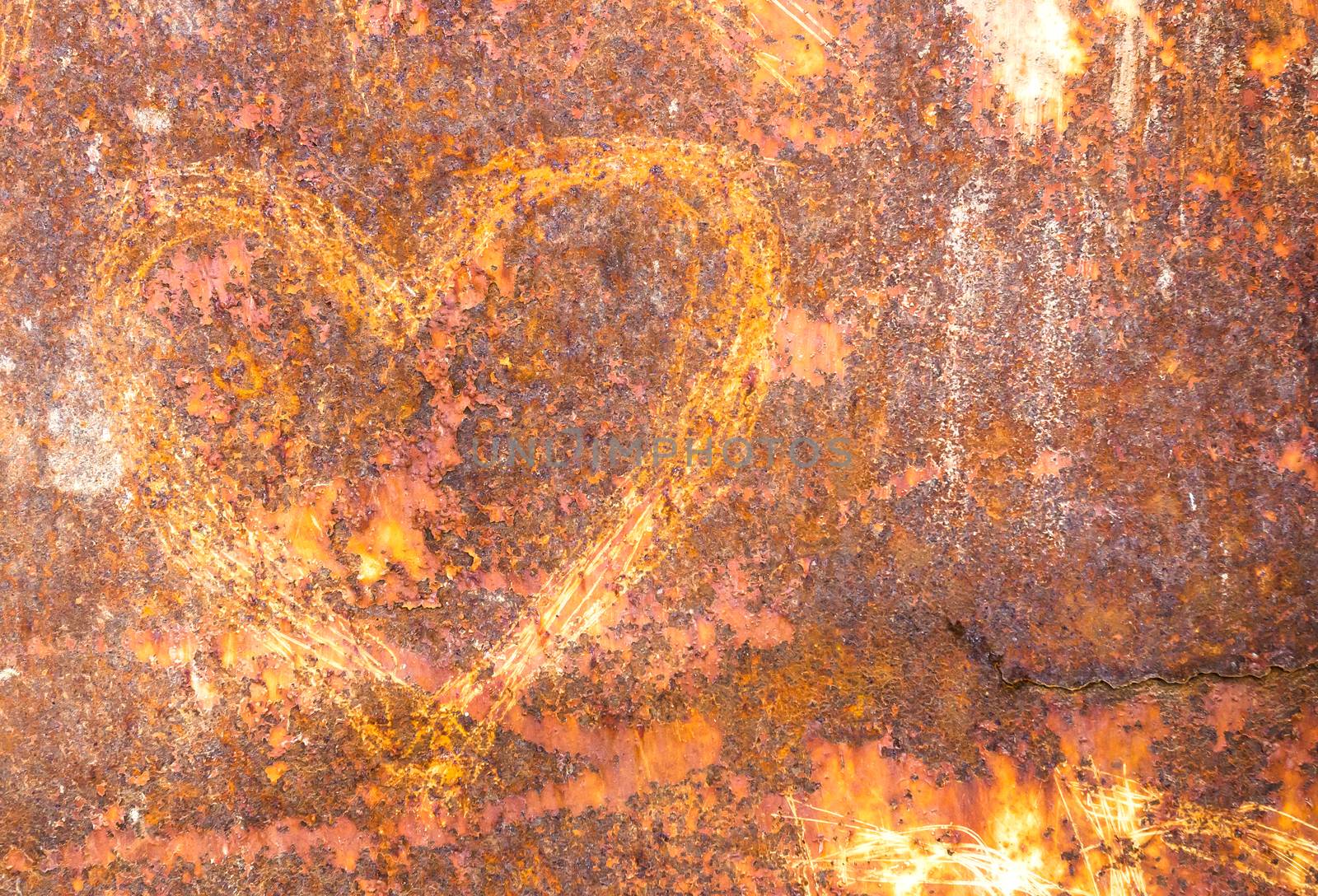 Rusty background in grunge style with abstract heart