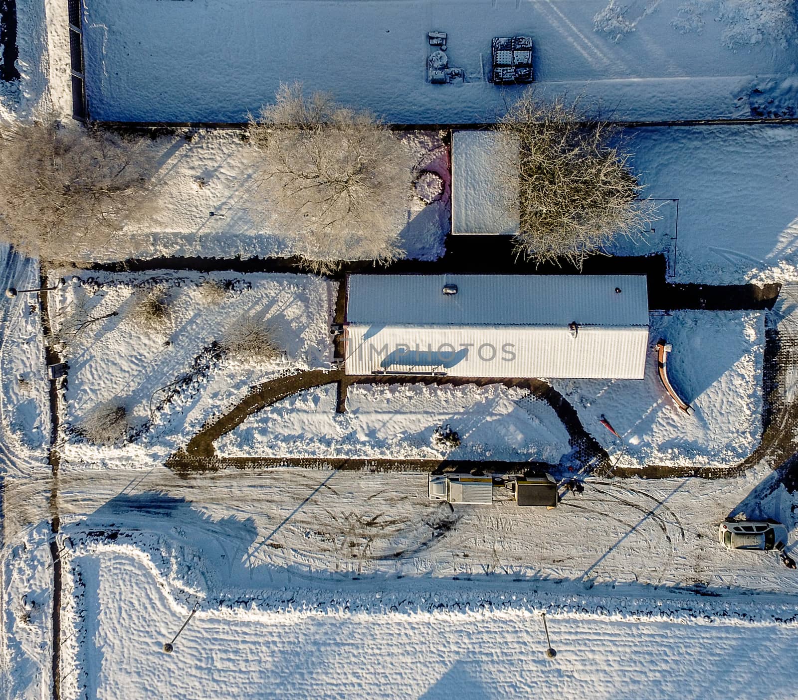 Aerial photo in winter, hall in the snow  by geogif