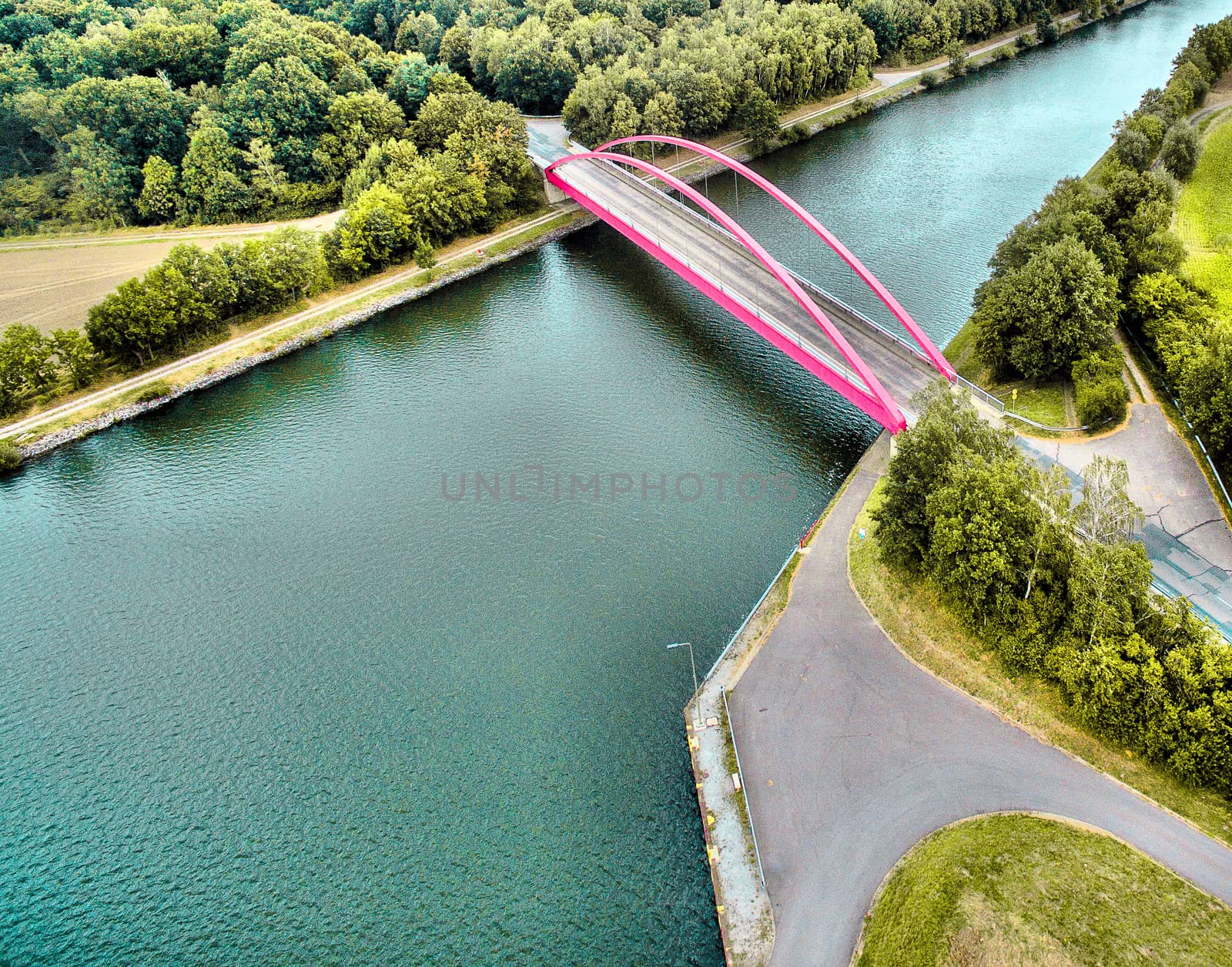pink bridge about a canal  by geogif