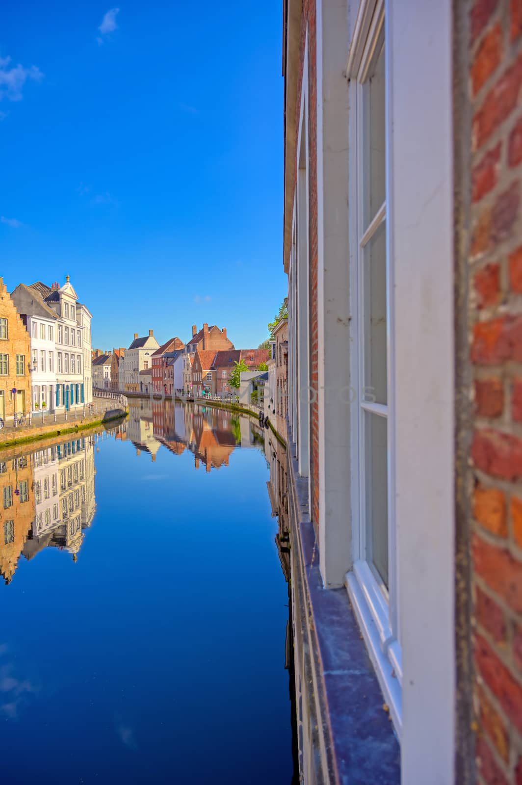 The canals of Bruges (Brugge), Belgium on a sunny day.