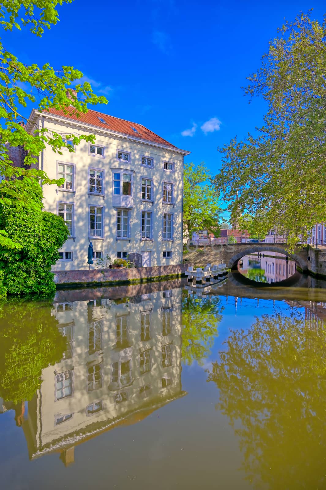 The canals of Bruges (Brugge), Belgium on a sunny day.