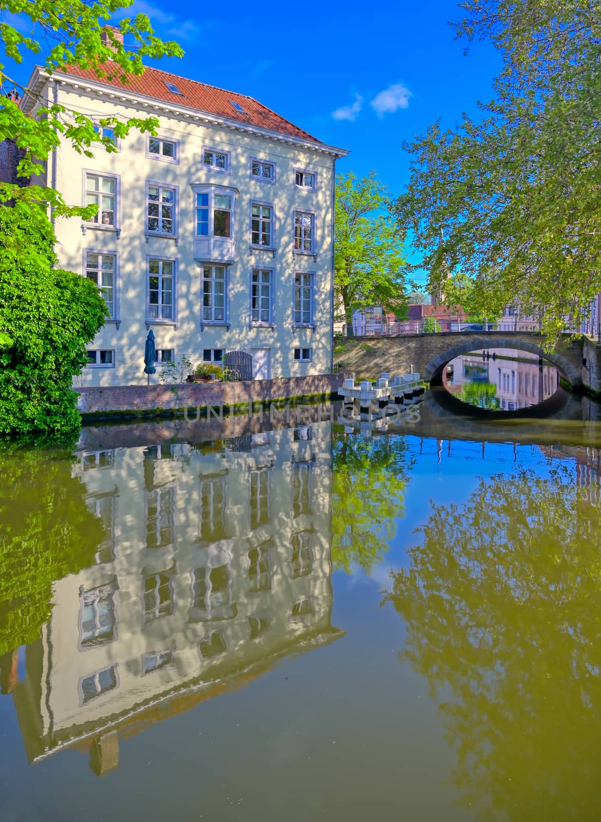 The canals of Bruges (Brugge), Belgium on a sunny day.