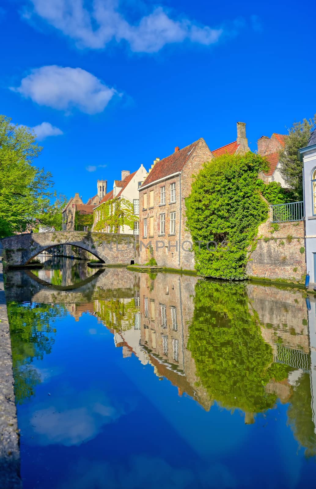 The canals of Bruges (Brugge), Belgium on a sunny day.