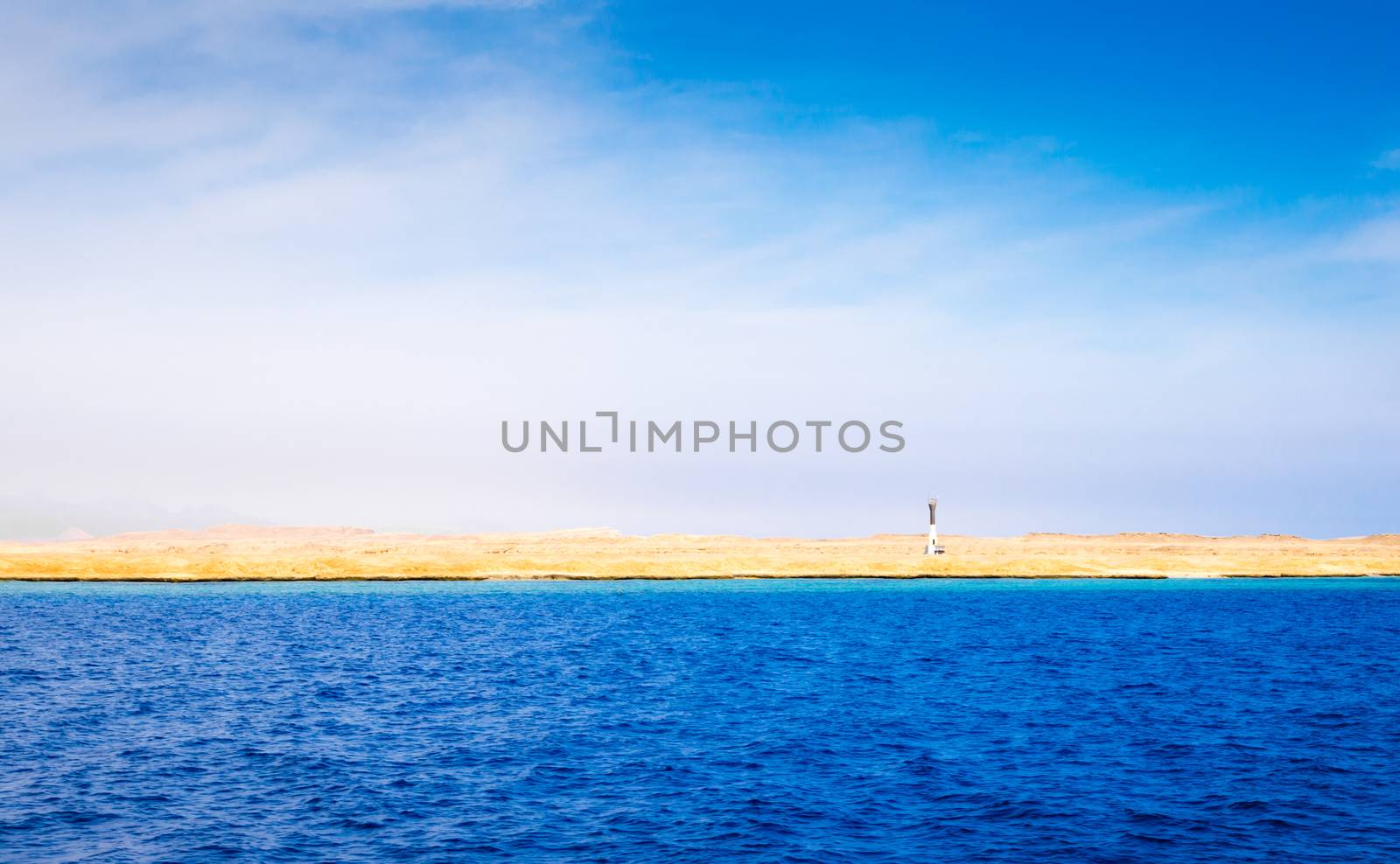 landscape coast of the Red Sea and blue sky with clouds in Sharm El Sheikh Egypt