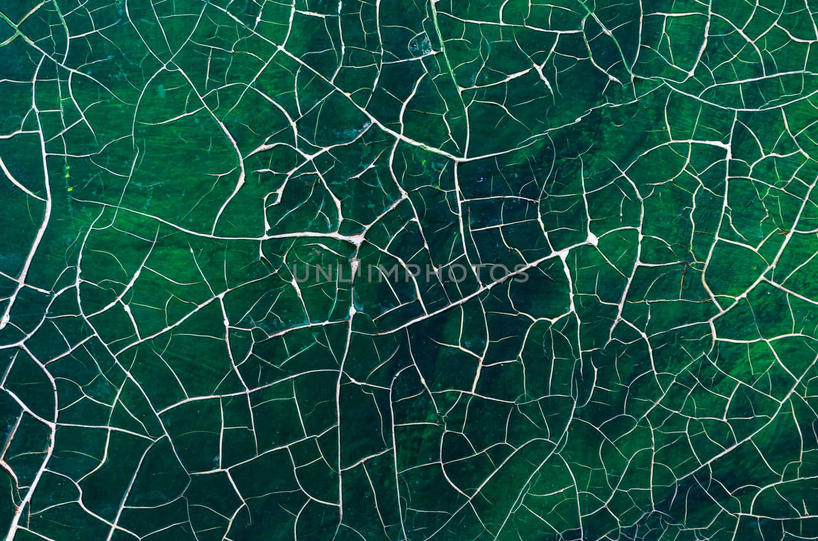 cracked paint on old picture close up abstract background art restoration pattern