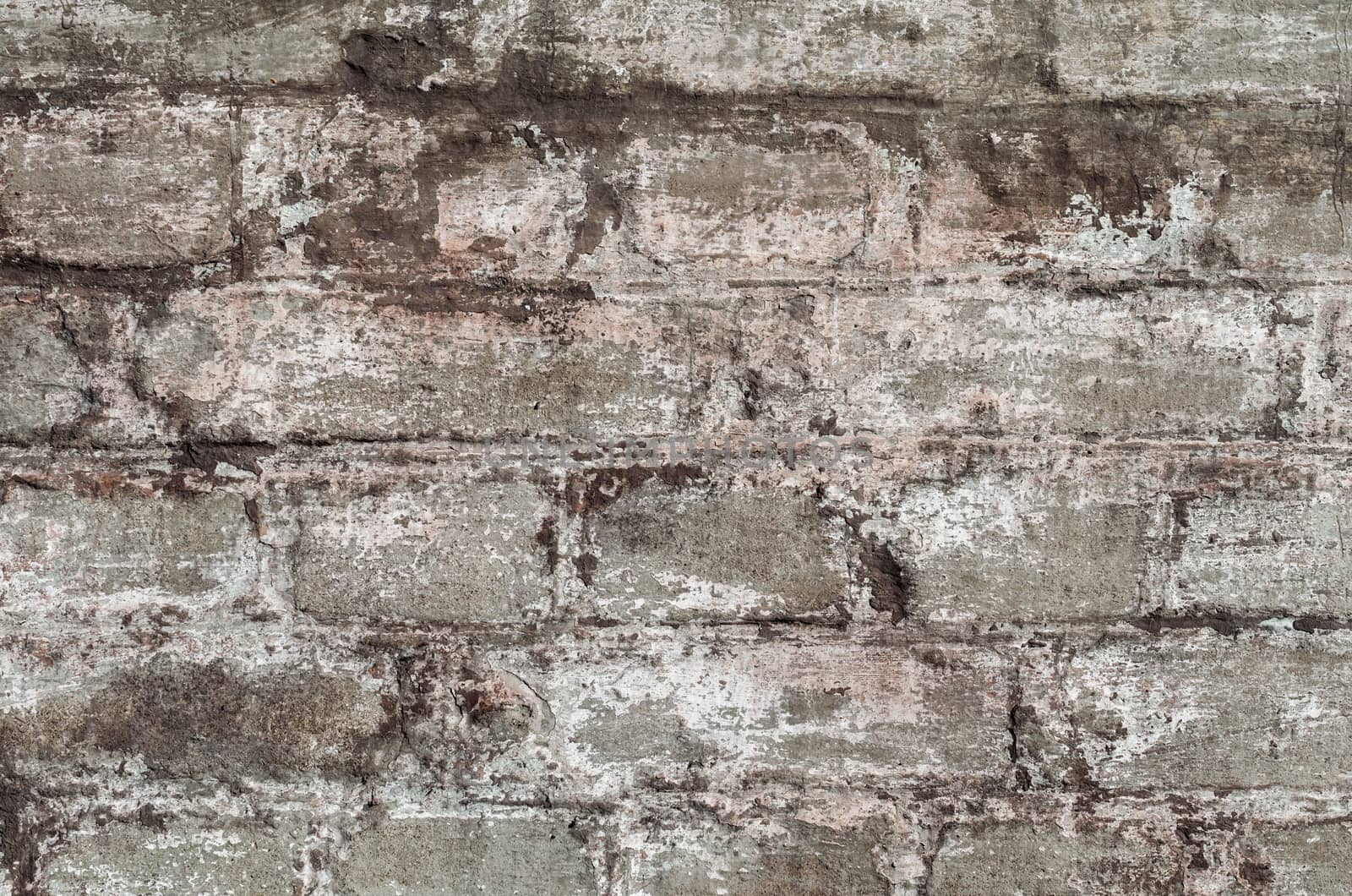 old stone brick rough dirty wall background pattern close up