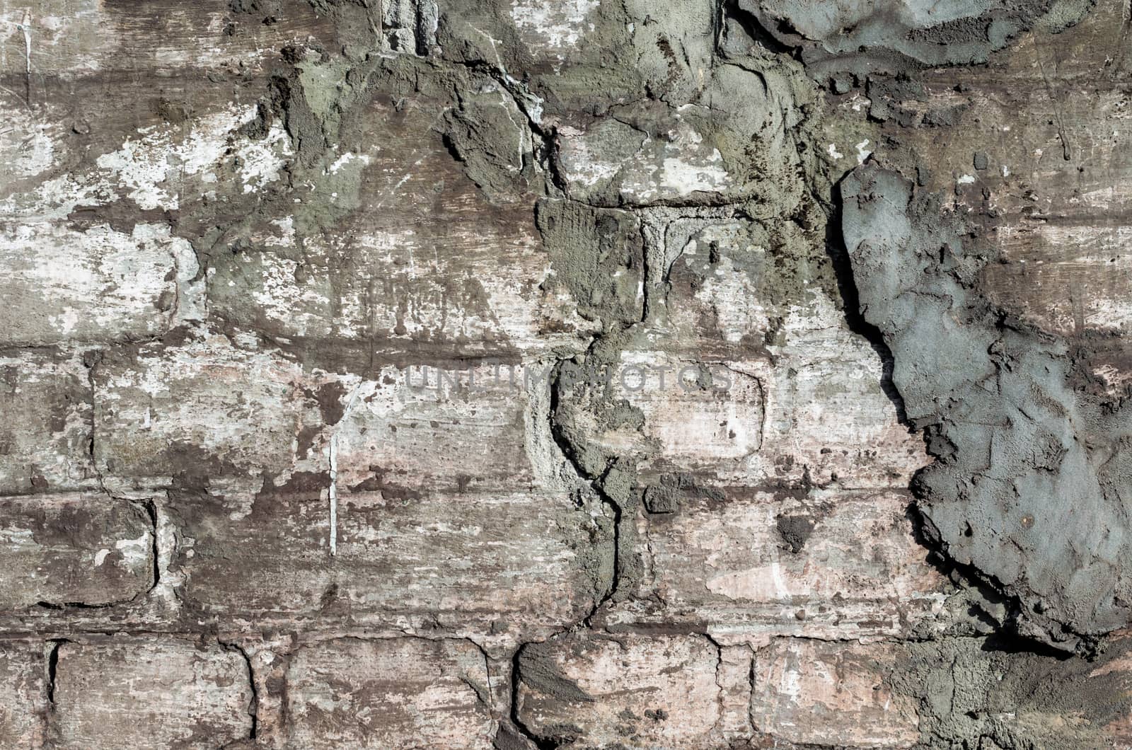 old stone brick rough dirty wall background pattern close up
