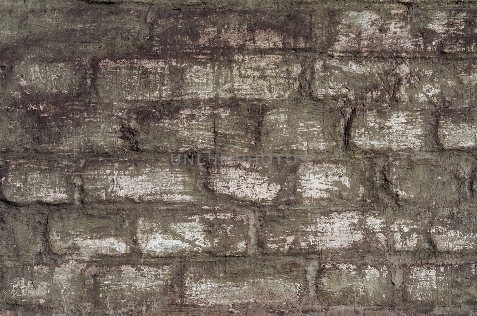 old stone brick rough dirty wall background pattern close up