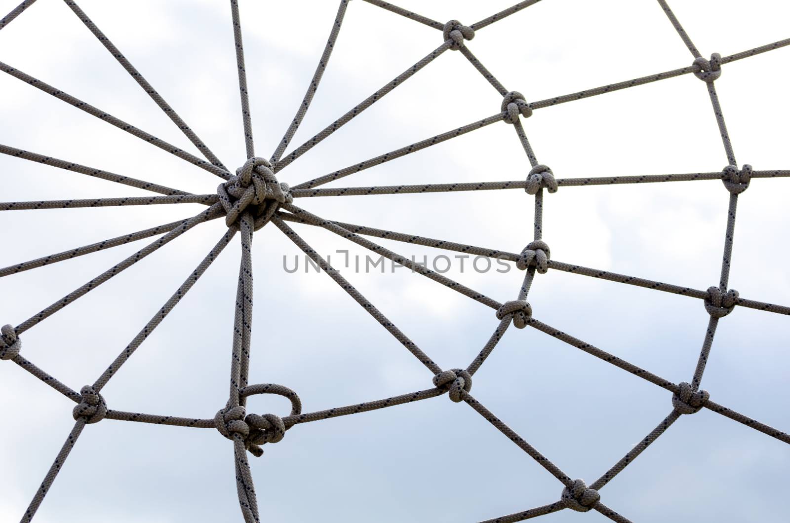 many ropes and one big knot black and white abstract background isolated close up