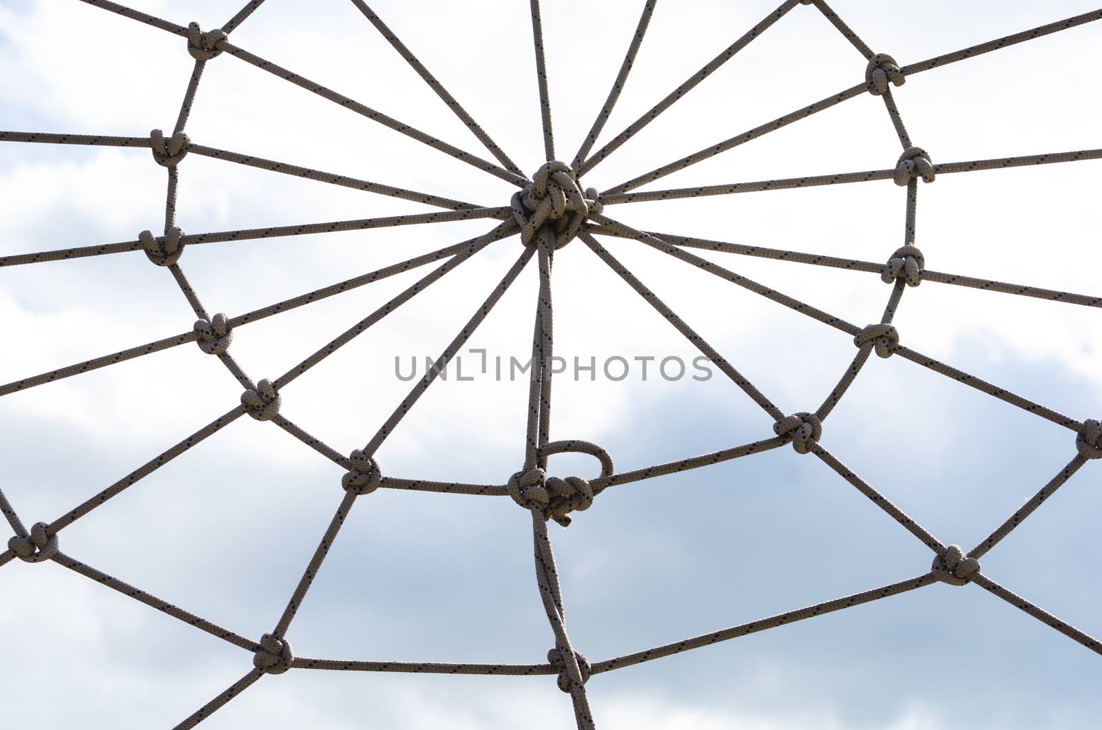 many ropes and one big knot black and white abstract background close up