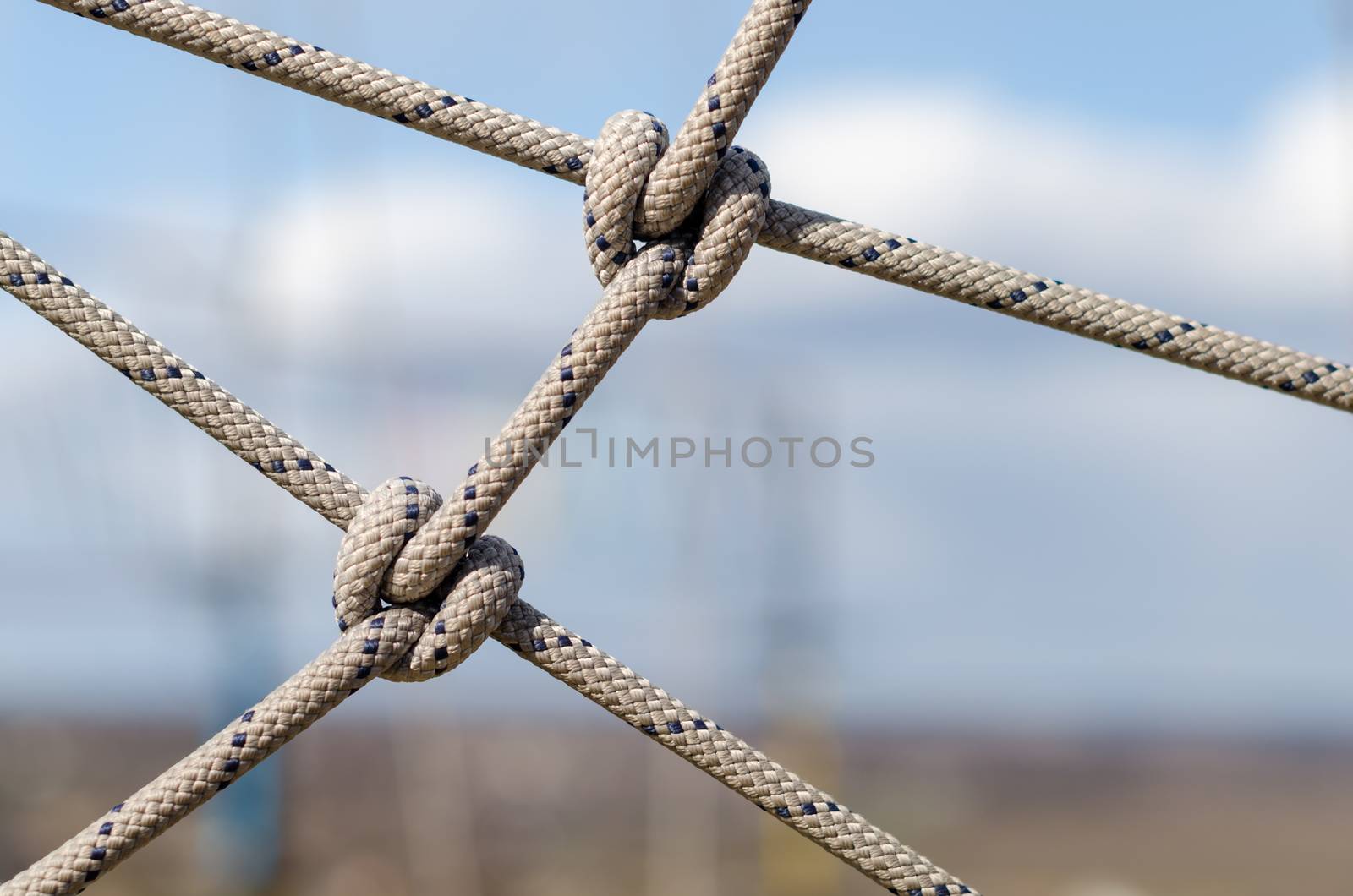 many ropes and one big knot black and white abstract background close up
