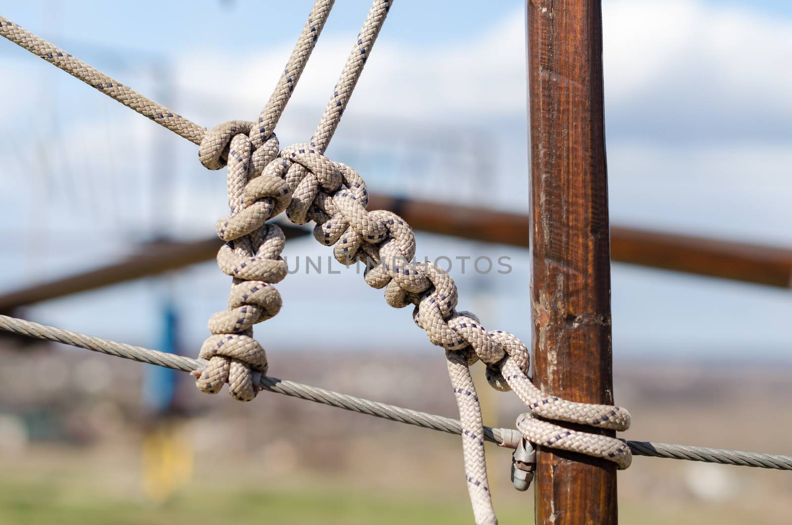 many ropes and one big knot black and white abstract background close up