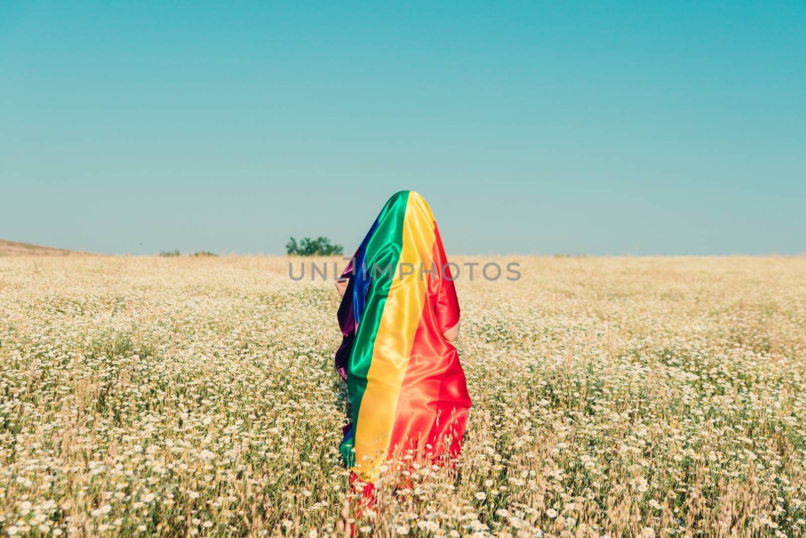 woman covered with lgbt flag by Fotoeventis